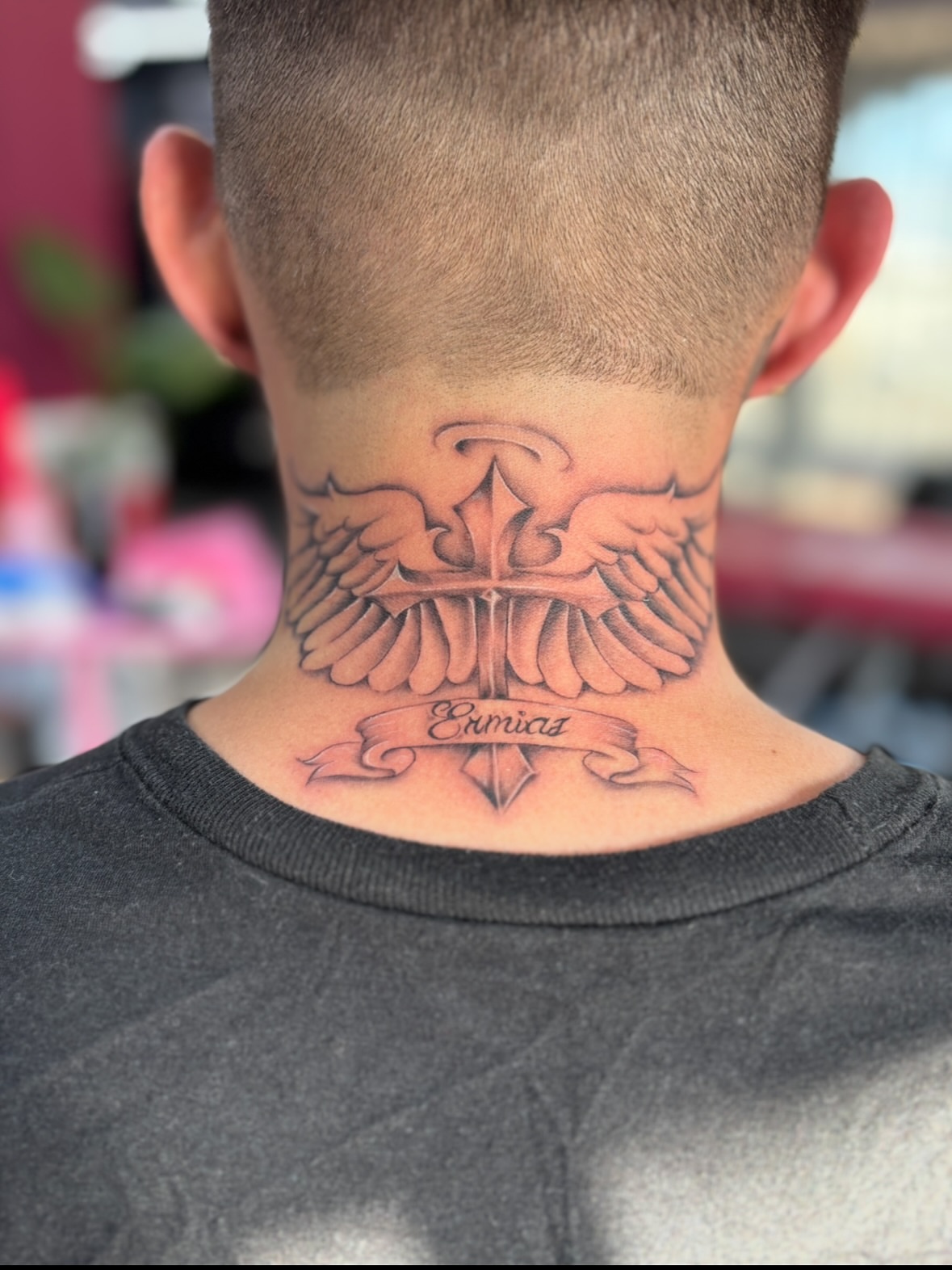 Wings and cross black and grey tattoo on the neck by $weet little leslie 🩶🧚🏻‍♀️