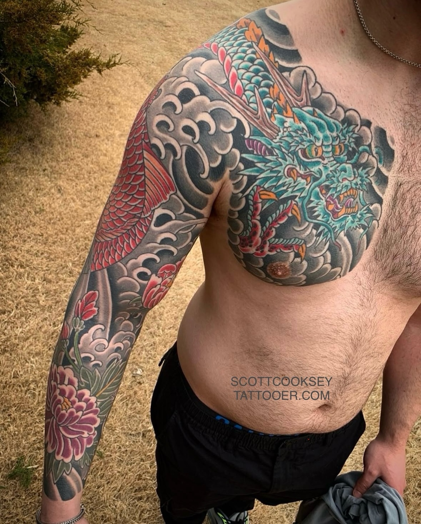 Dragon and floral japanese irezumi tattoo on the chest by Scott Allen Cooksey, Plano, Texas