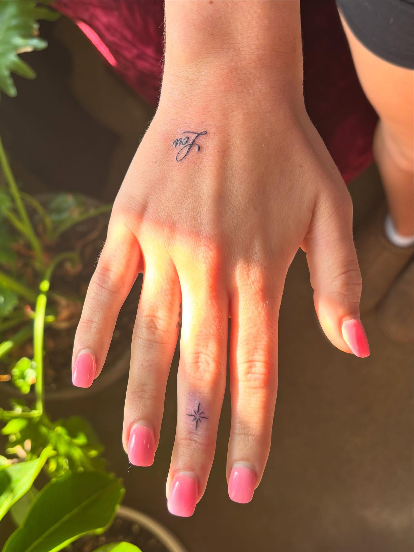 Initials lettering script tattoo on the hand by Anna Kathleen, Des Moines, Iowa