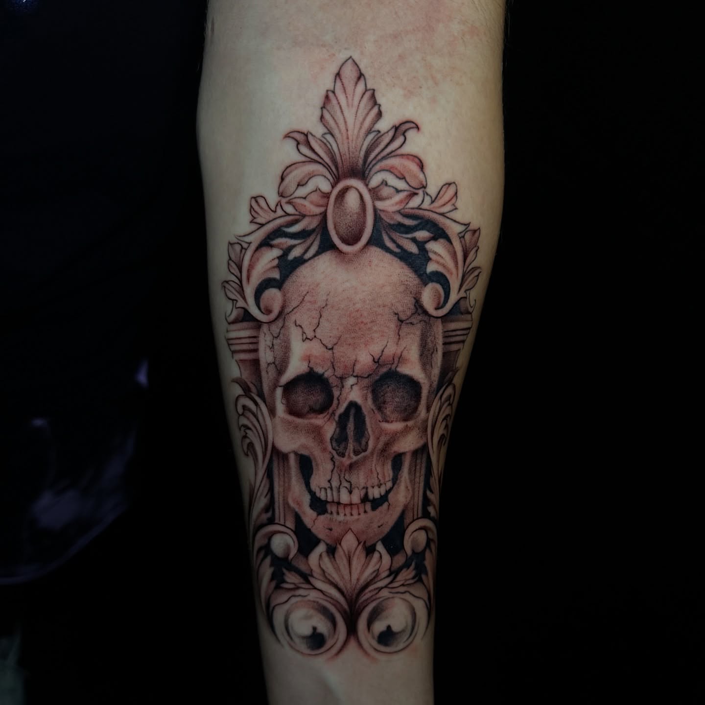 Skull realism tattoo on the forearm by Dani B.