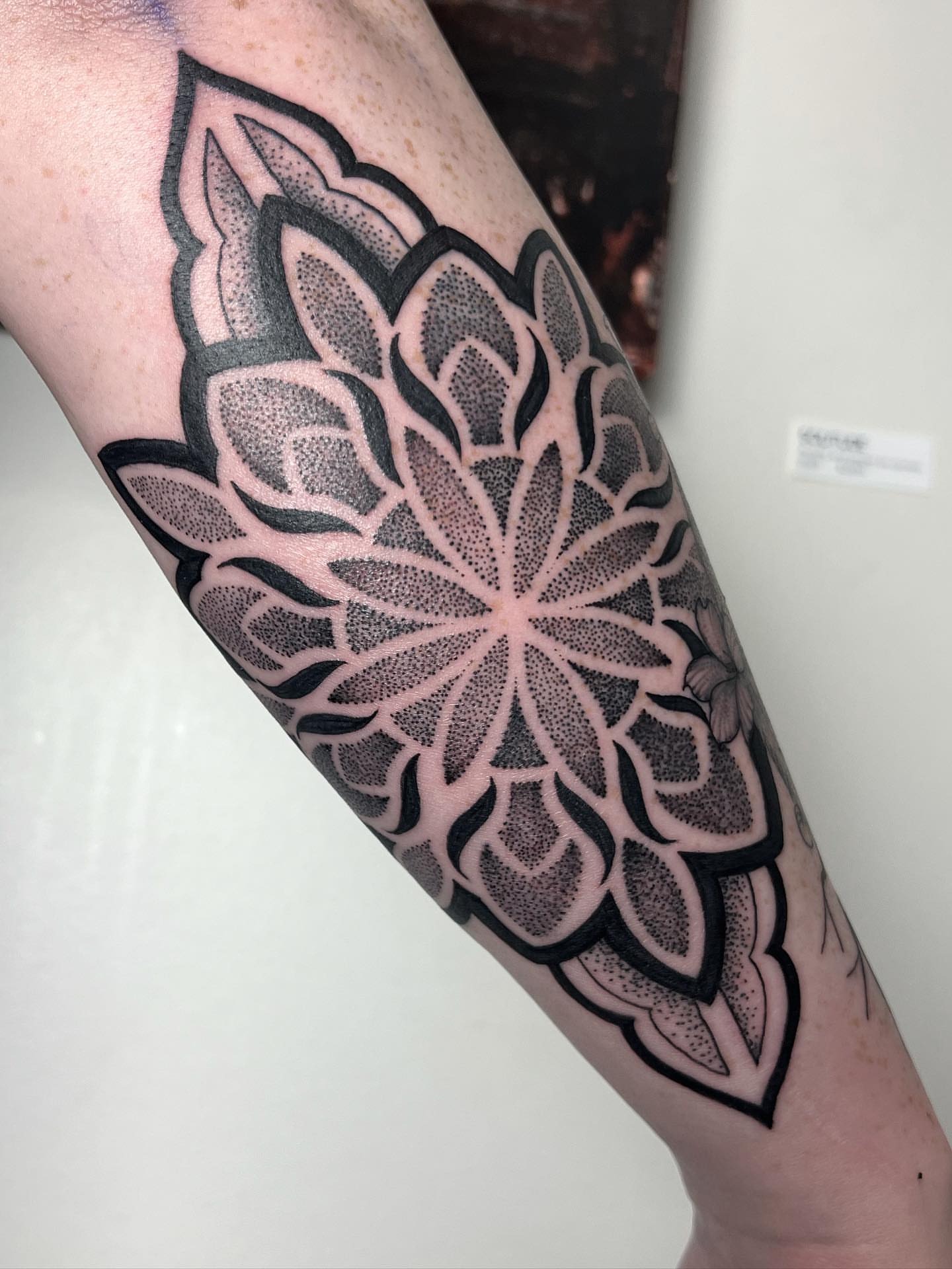 Tattoo by @hiddenheart_tattoo — dotwork