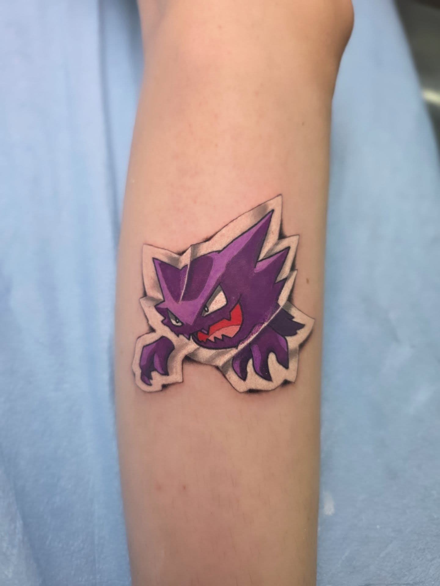 Gengar geometric tattoo on the forearm by Jake Barney