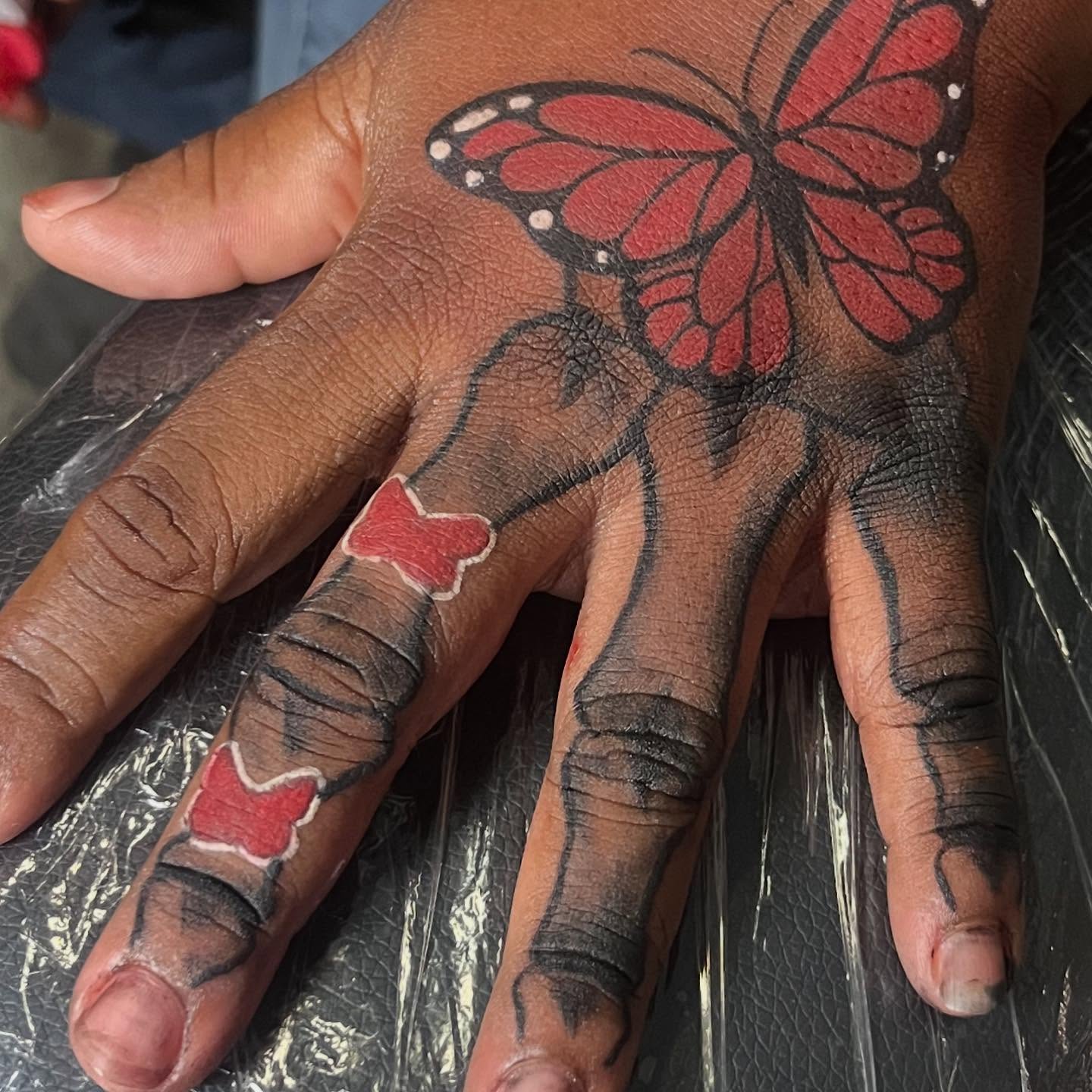Butterfly dotwork tattoo on the hand by Bris