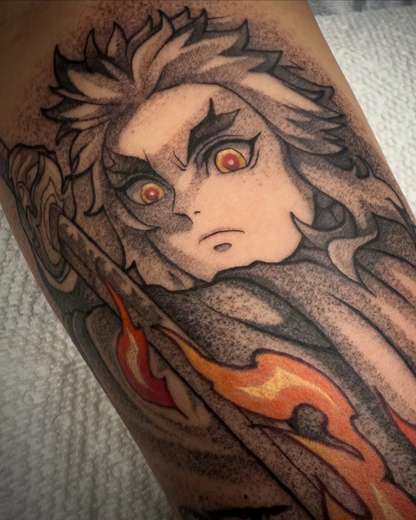 Anime character anime tattoo on the forearm by Angel Rodriguez