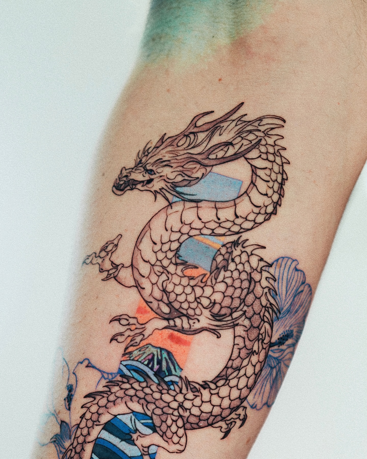Dragon japanese irezumi tattoo on the forearm by Seattle