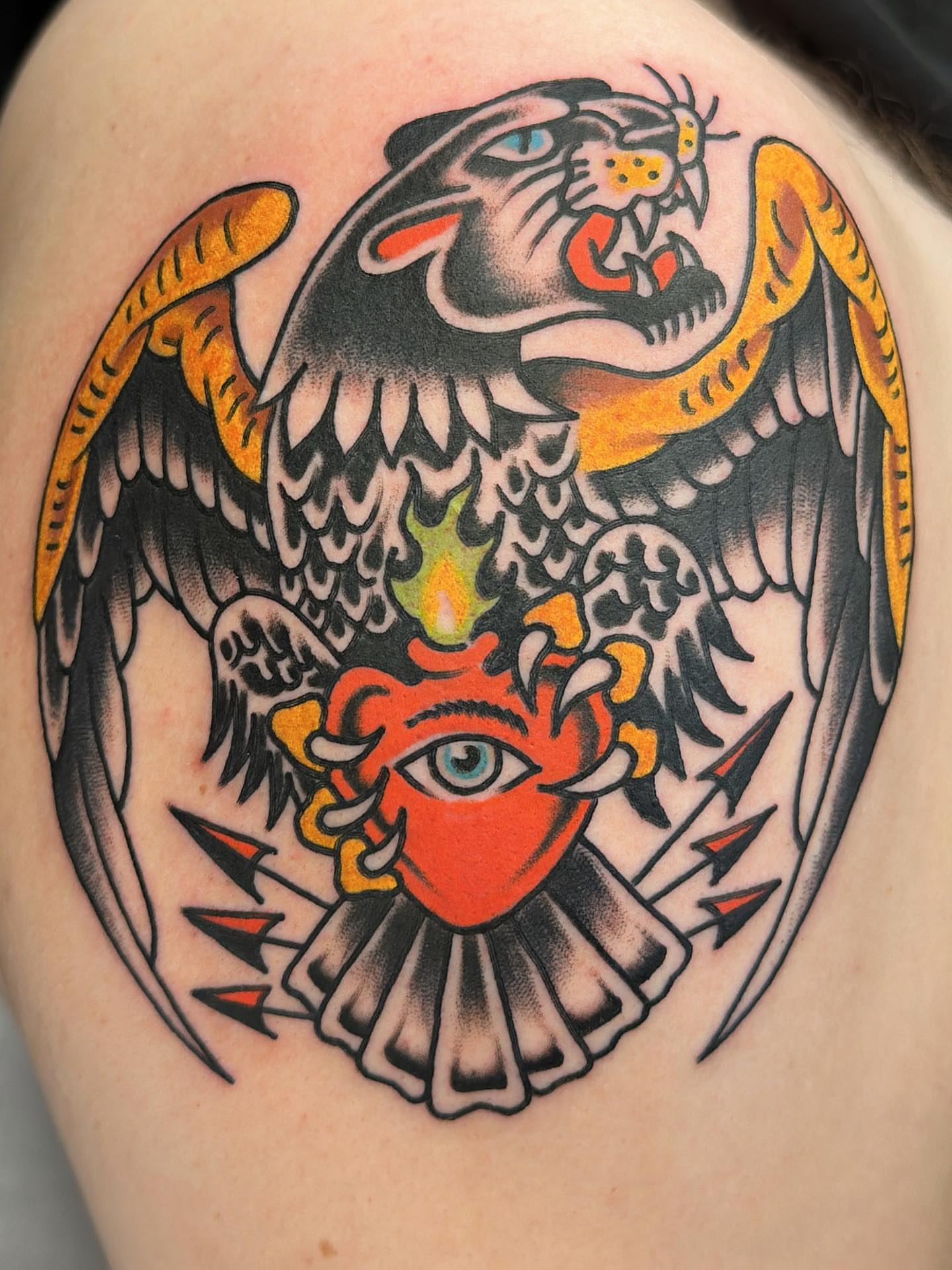 Panther and devil American traditional tattoo on the shoulder by Isaac Brethauer