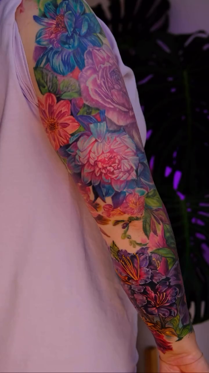 Floral sleeve neo-traditional tattoo by Colorful Tattoos by Cody Dean