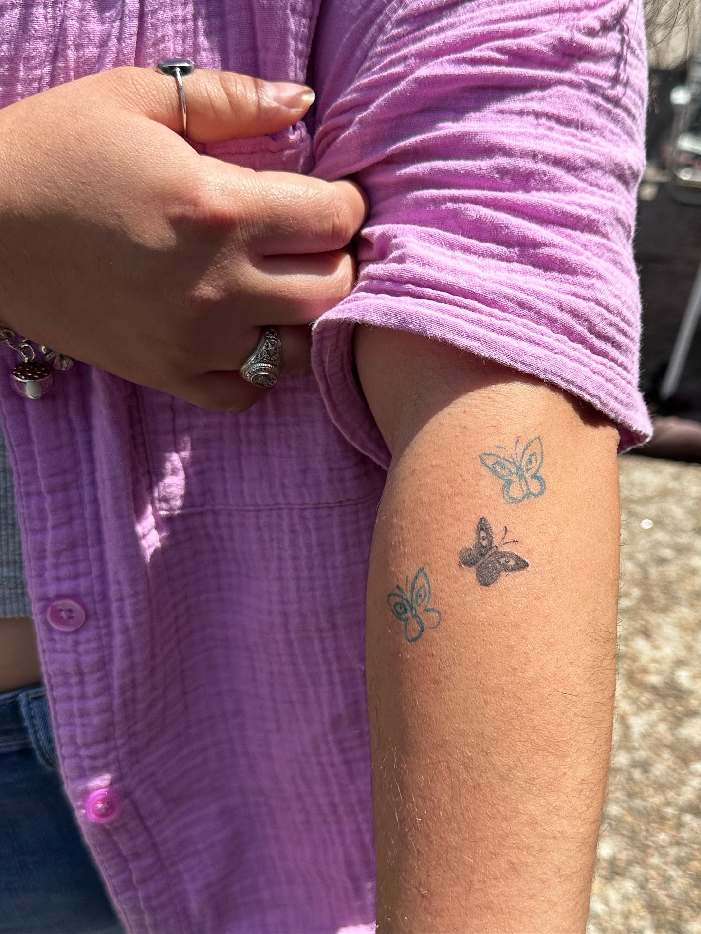 Butterfly black and grey tattoo on the forearm by cora cupid