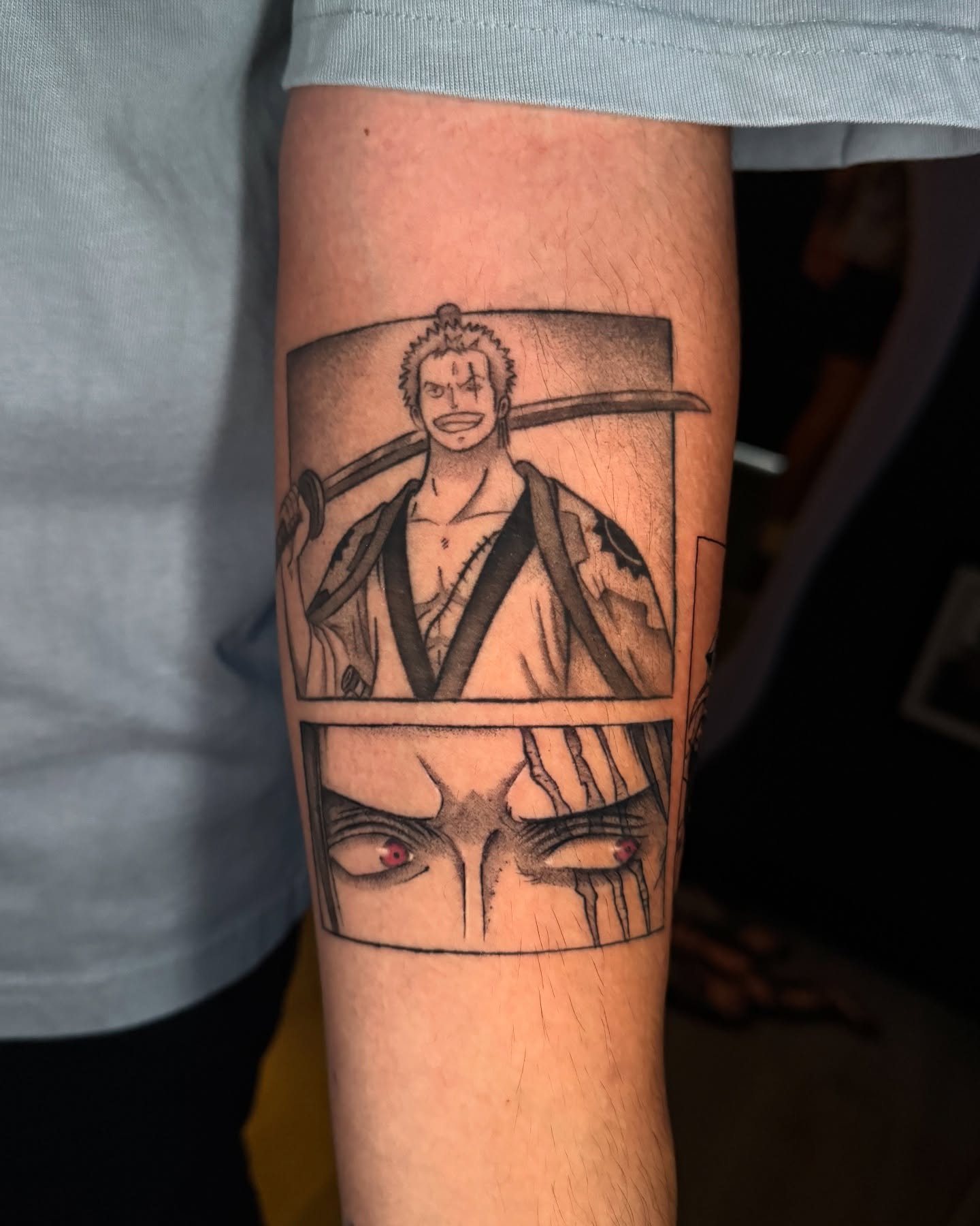 Anime character realism tattoo on the forearm by kelsey hackett