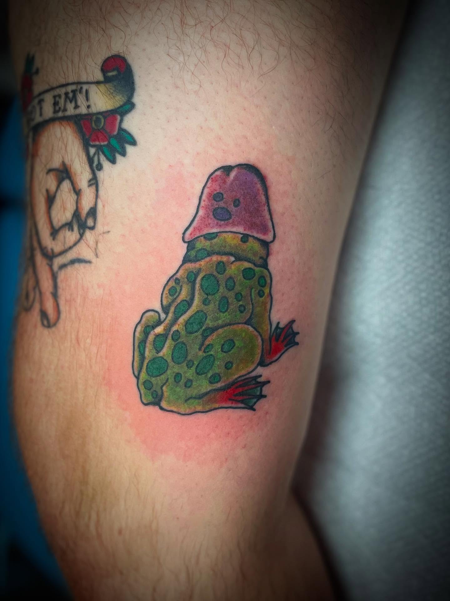 Frog American traditional tattoo on the thigh by JD Bassett