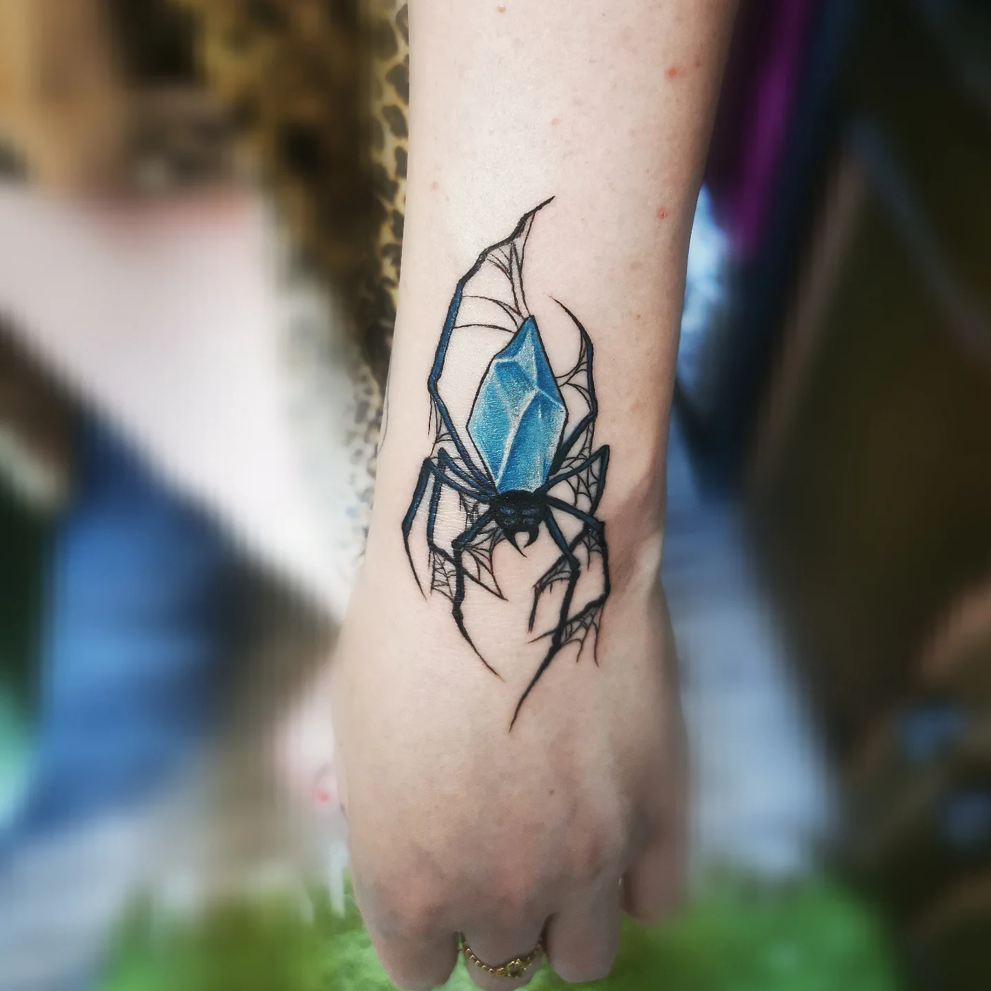 Spider geometric tattoo on the forearm by Ink of Winchester
