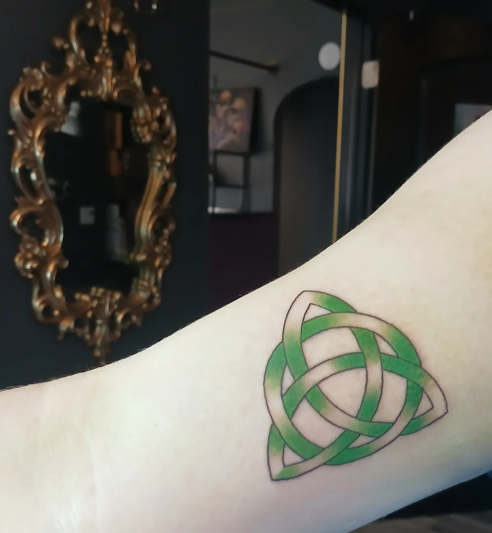 Knot geometric tattoo on the forearm by Cassieal Welch