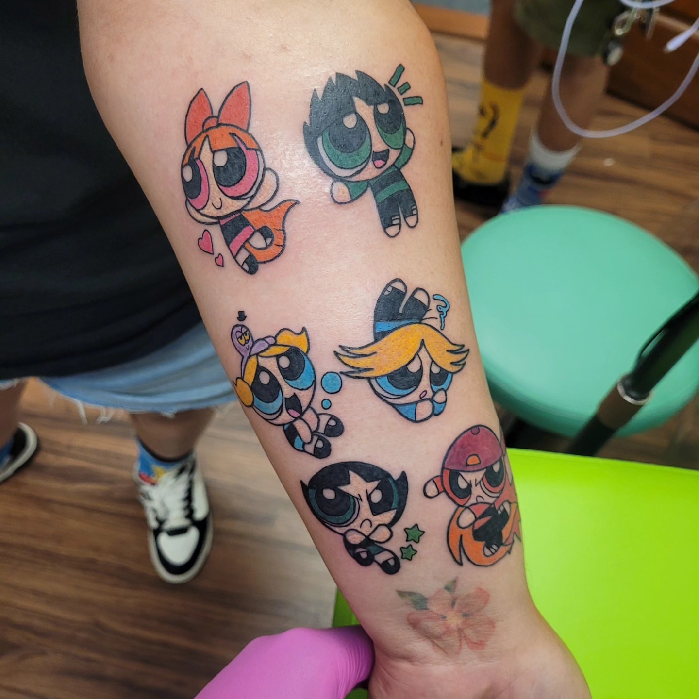 Powerpuff girls anime tattoo on the forearm by Wray Saulsberry
