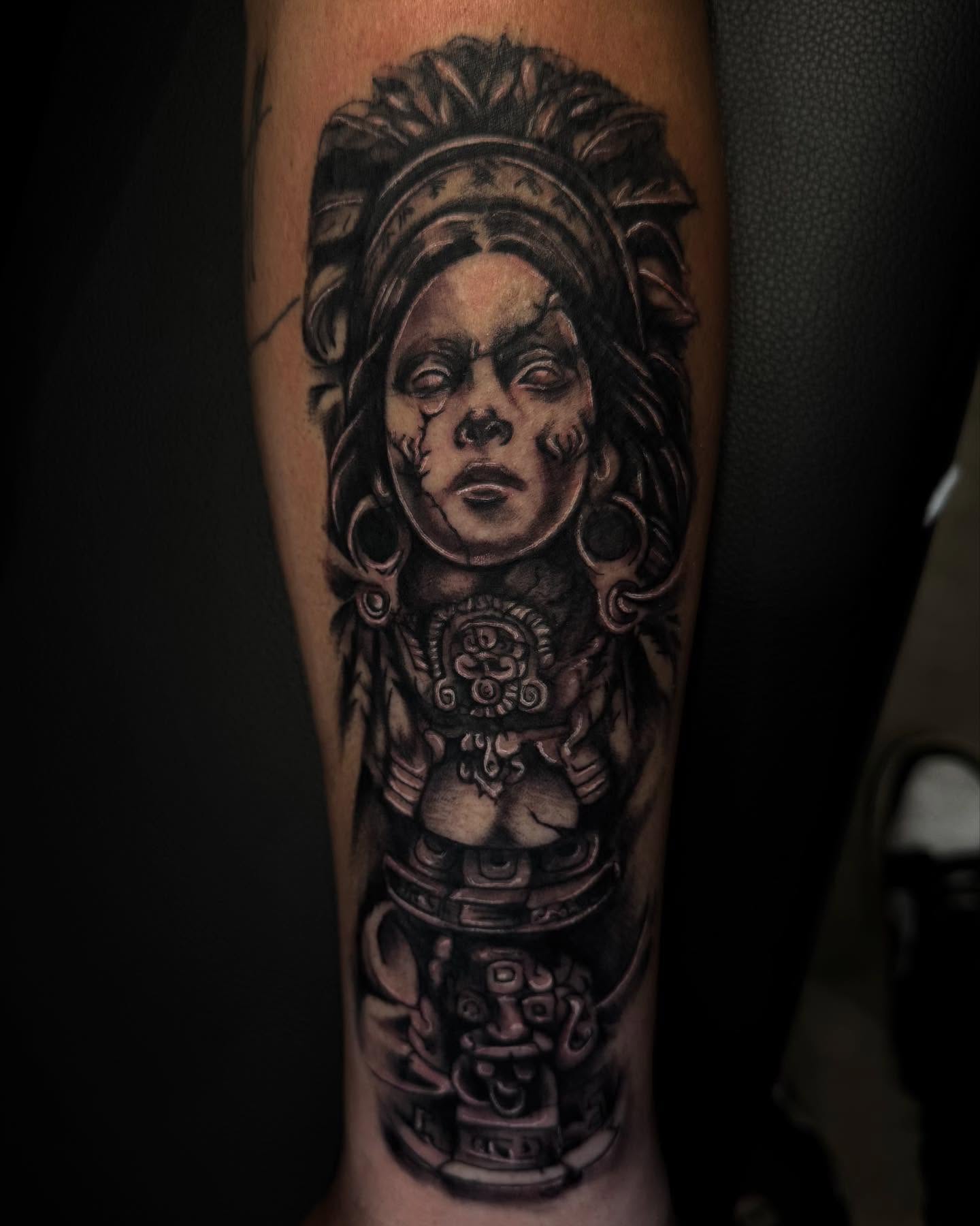 Ancient figure realism tattoo on the forearm by Therapy ink
