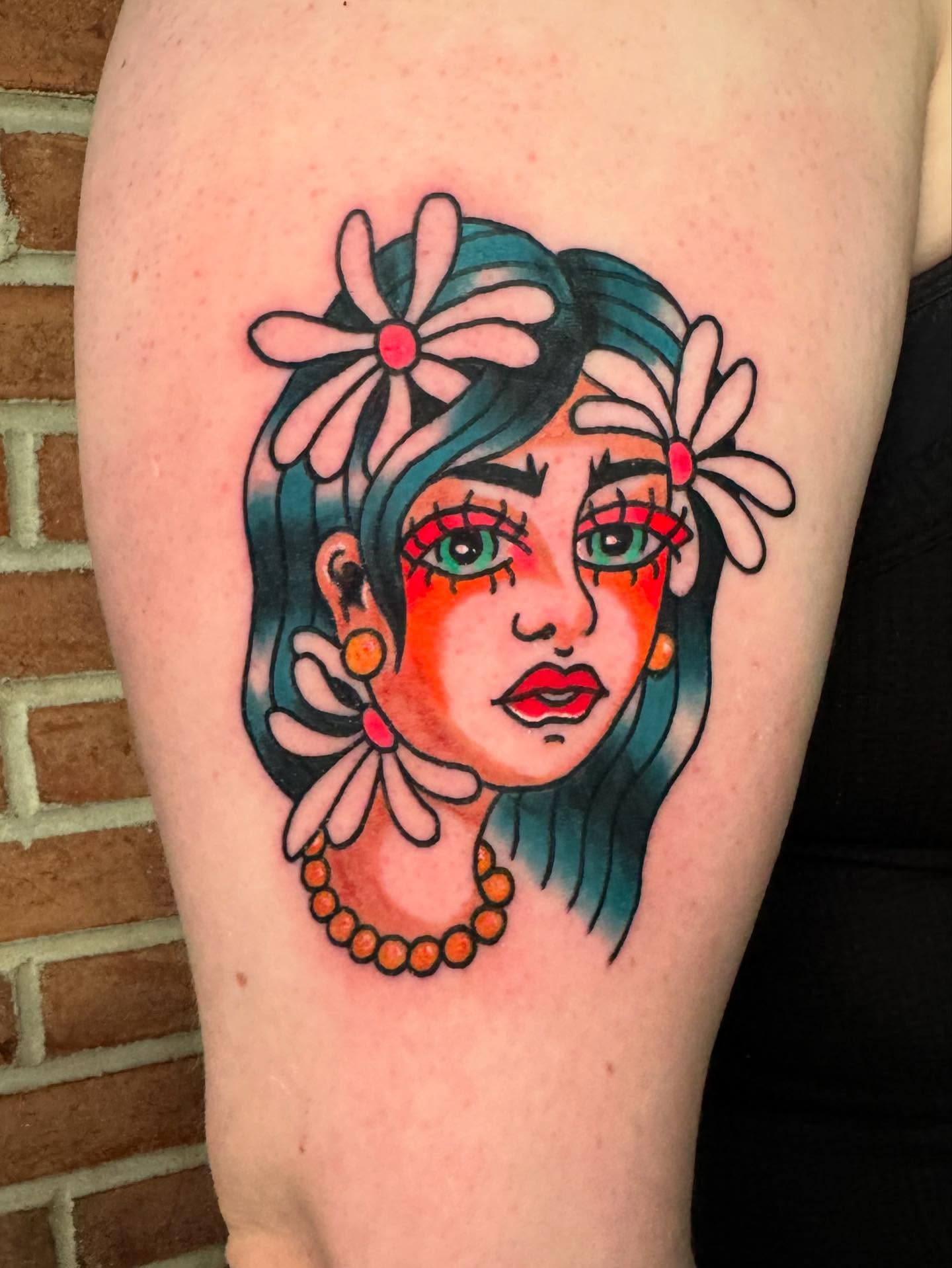 Woman with flowers American traditional tattoo on the thigh by Perrey
