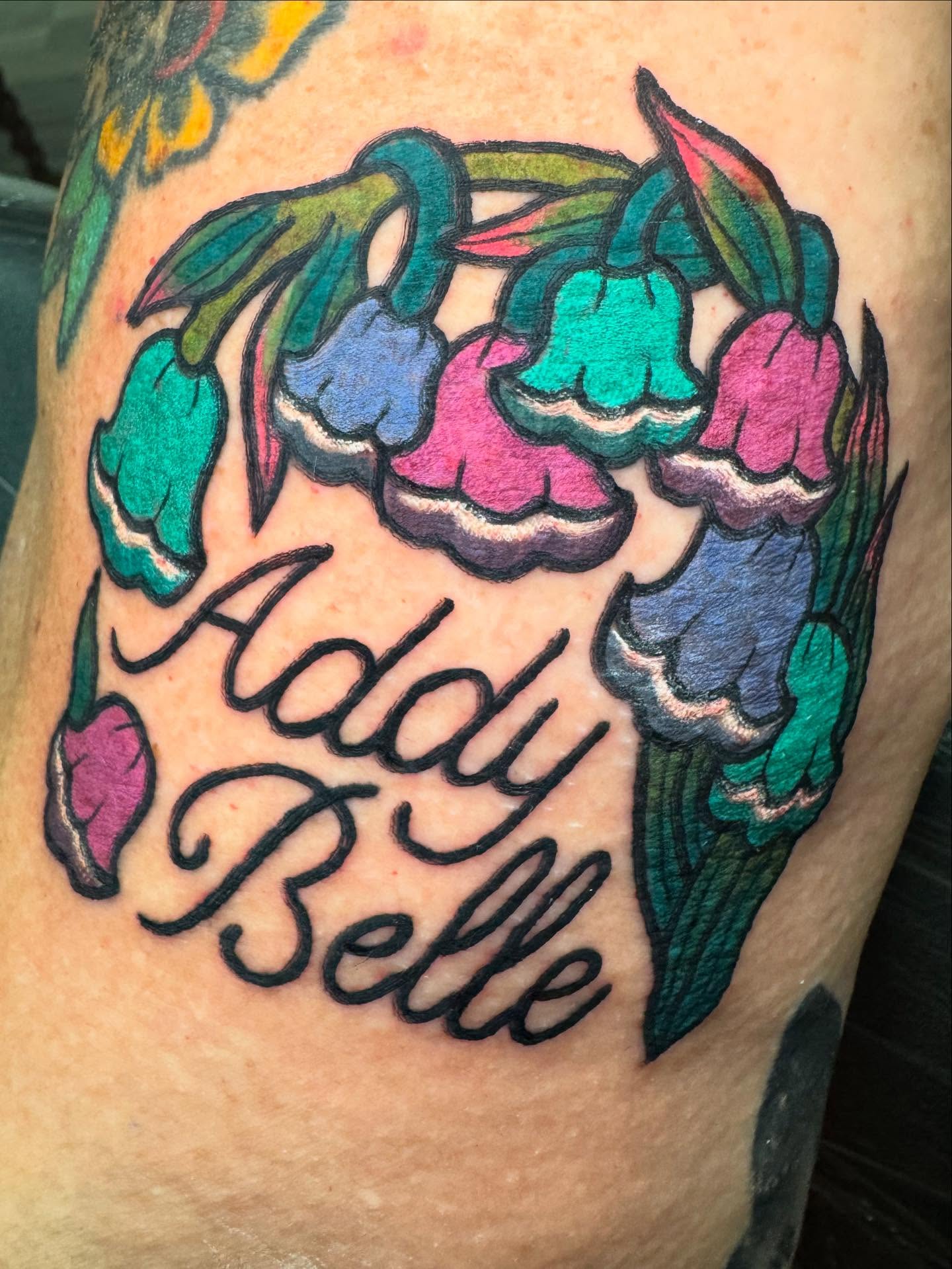 Bell flowers American traditional tattoo on the thigh by Perrey