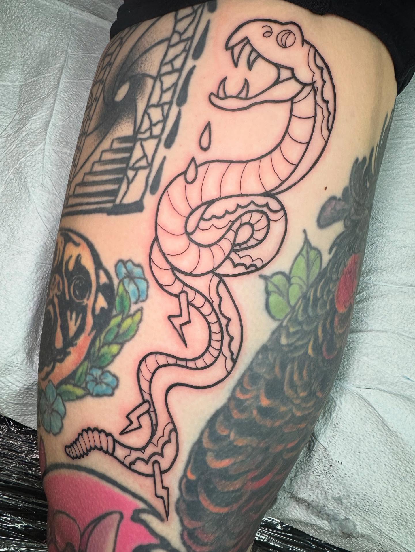 Snake American traditional tattoo on the thigh by Perrey