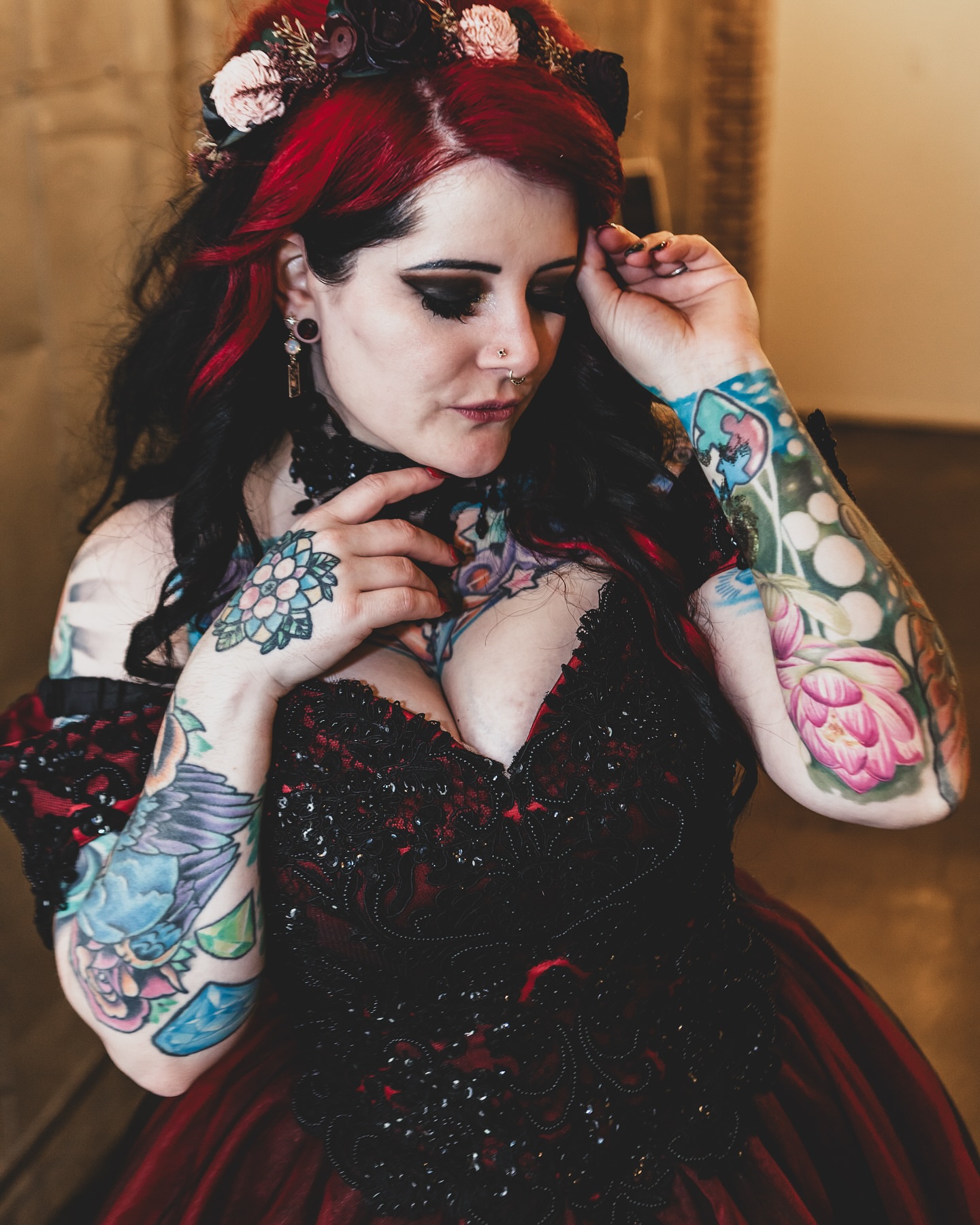 Floral American traditional tattoo on the upper arm by Bryan Parsons