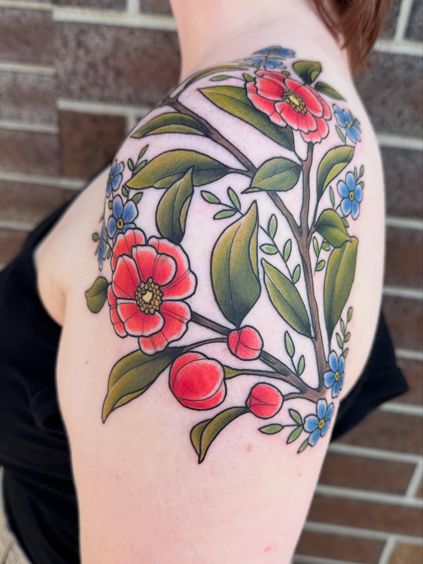 Cherry blossoms American traditional tattoo on the shoulder by Nikki Powills