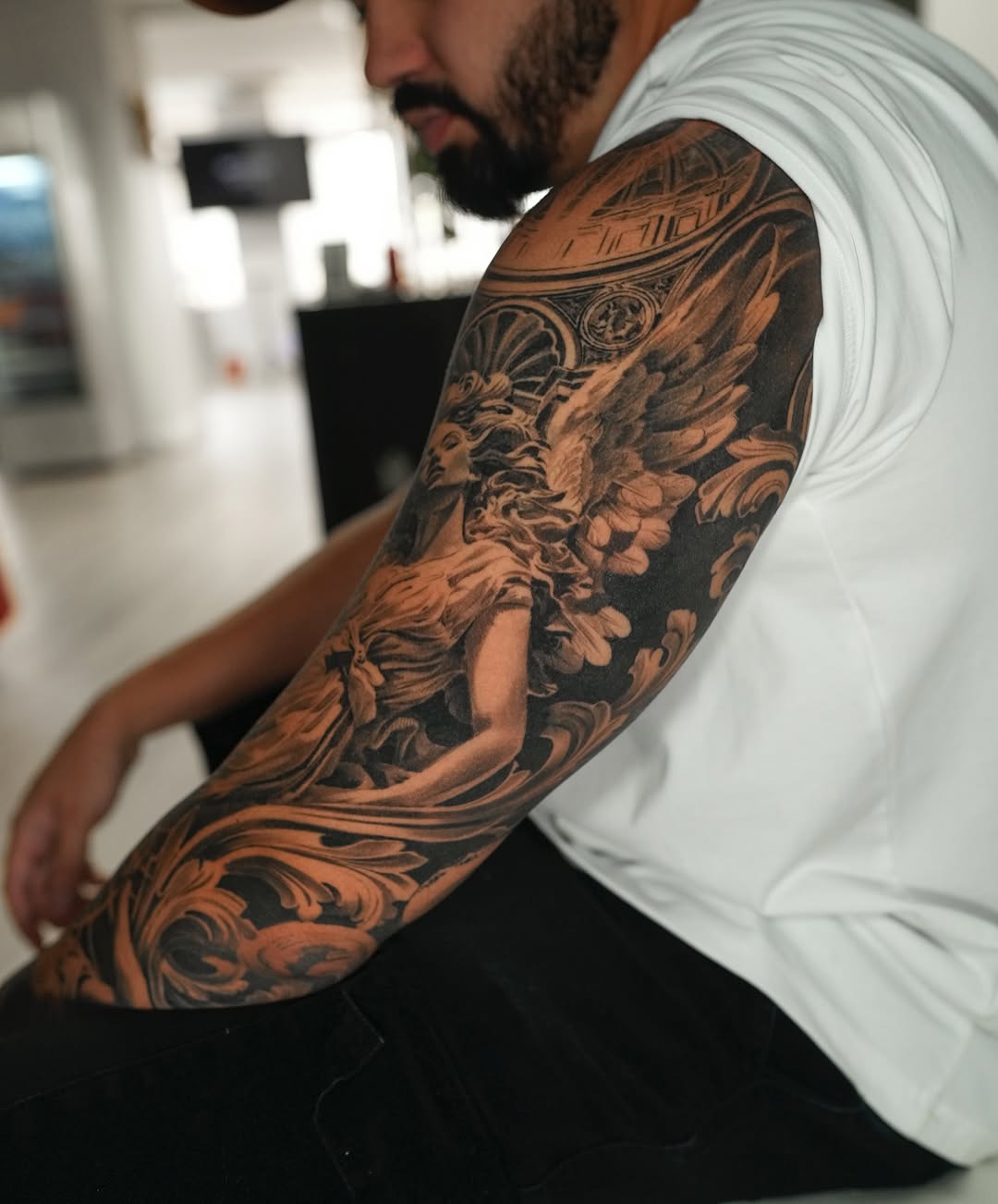 Tattoo by @nogarolli_tattoo — realism, black_and_grey
