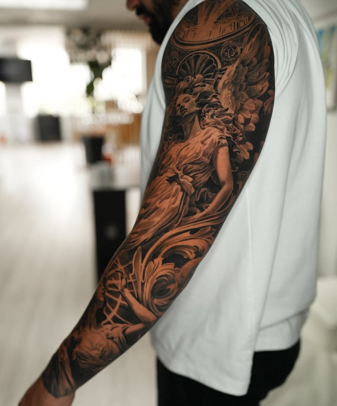 Tattoo by @nogarolli_tattoo — realism, black_and_grey