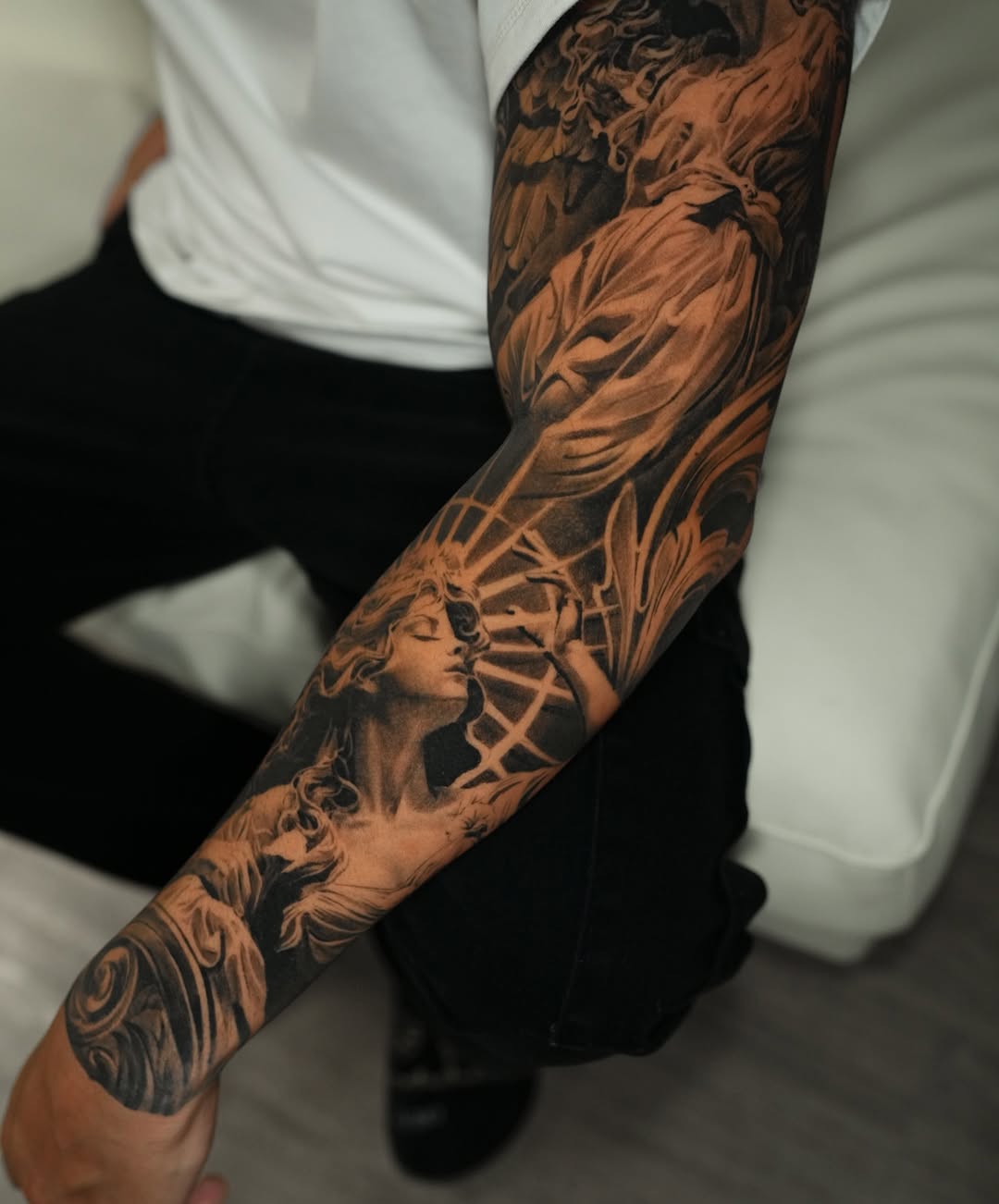 Tattoo by @nogarolli_tattoo — realism, black_and_grey