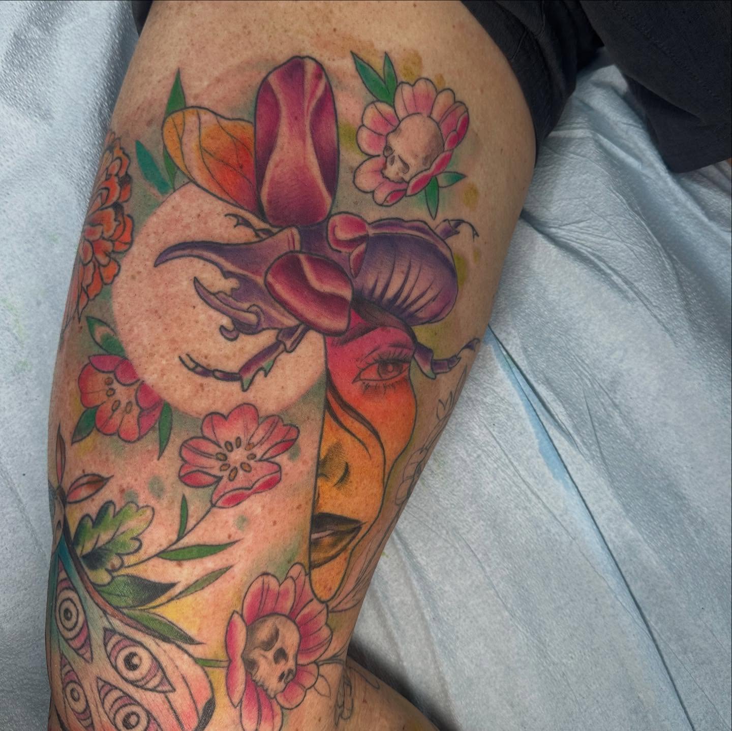 Floral portrait American traditional tattoo on the thigh by Halle Haas