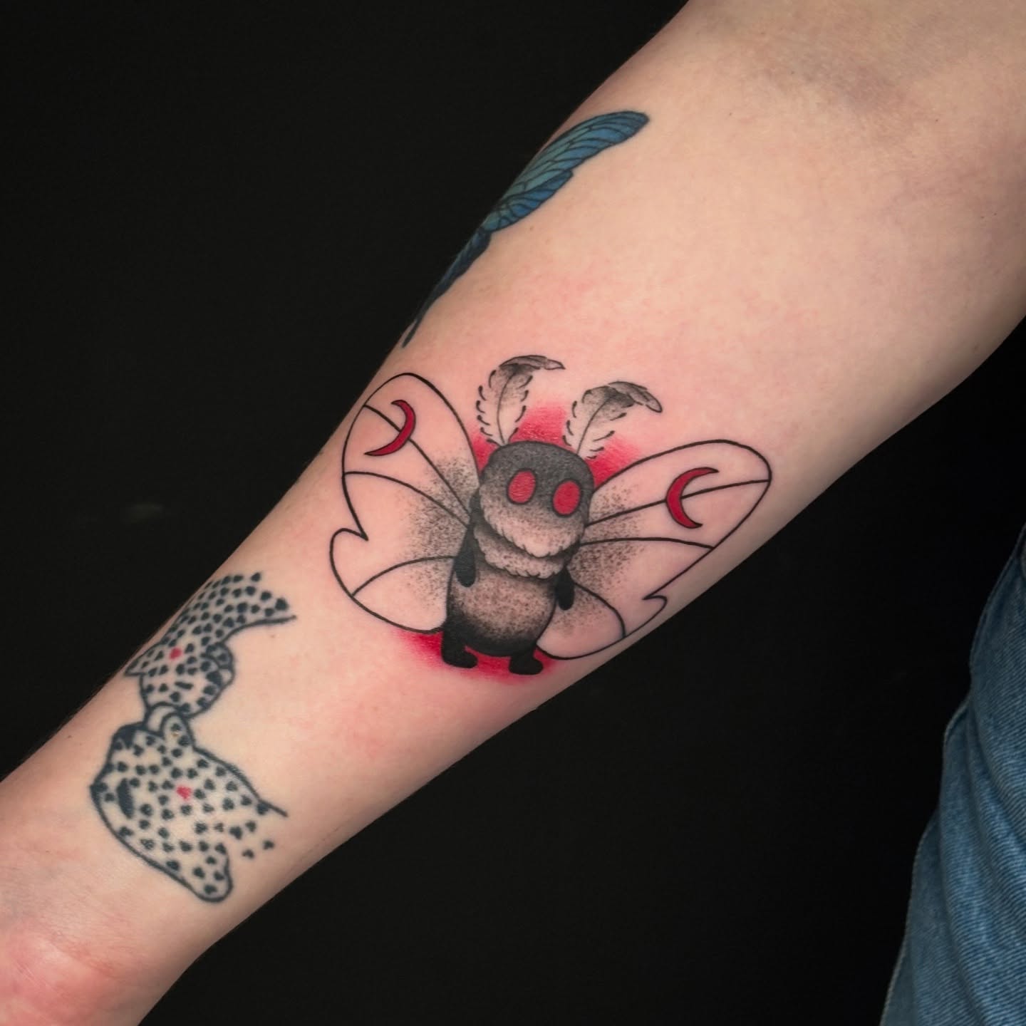 Insect dotwork tattoo on the forearm by Sarah Sacco