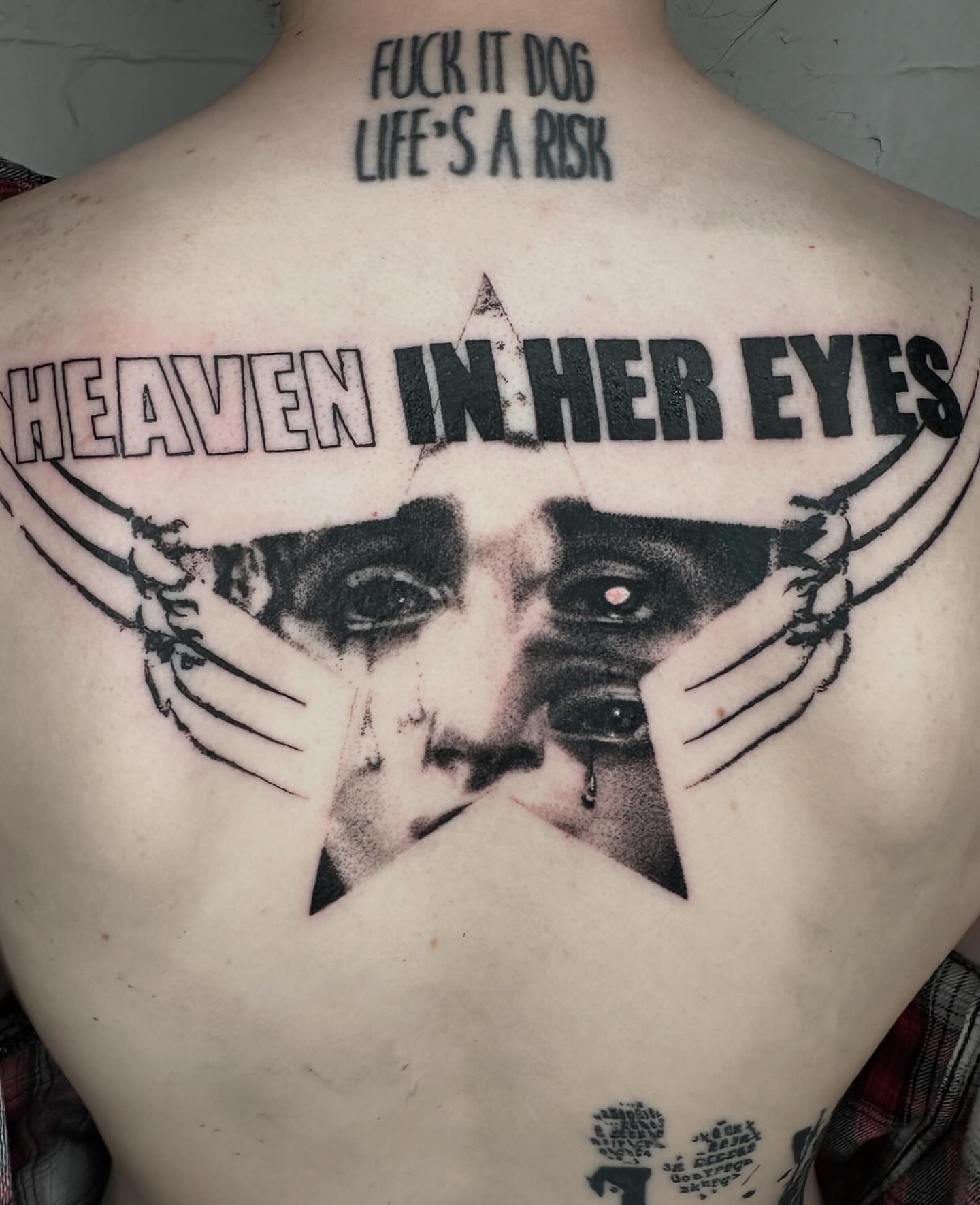 Woman's face realism tattoo on the back by πΈππππππ