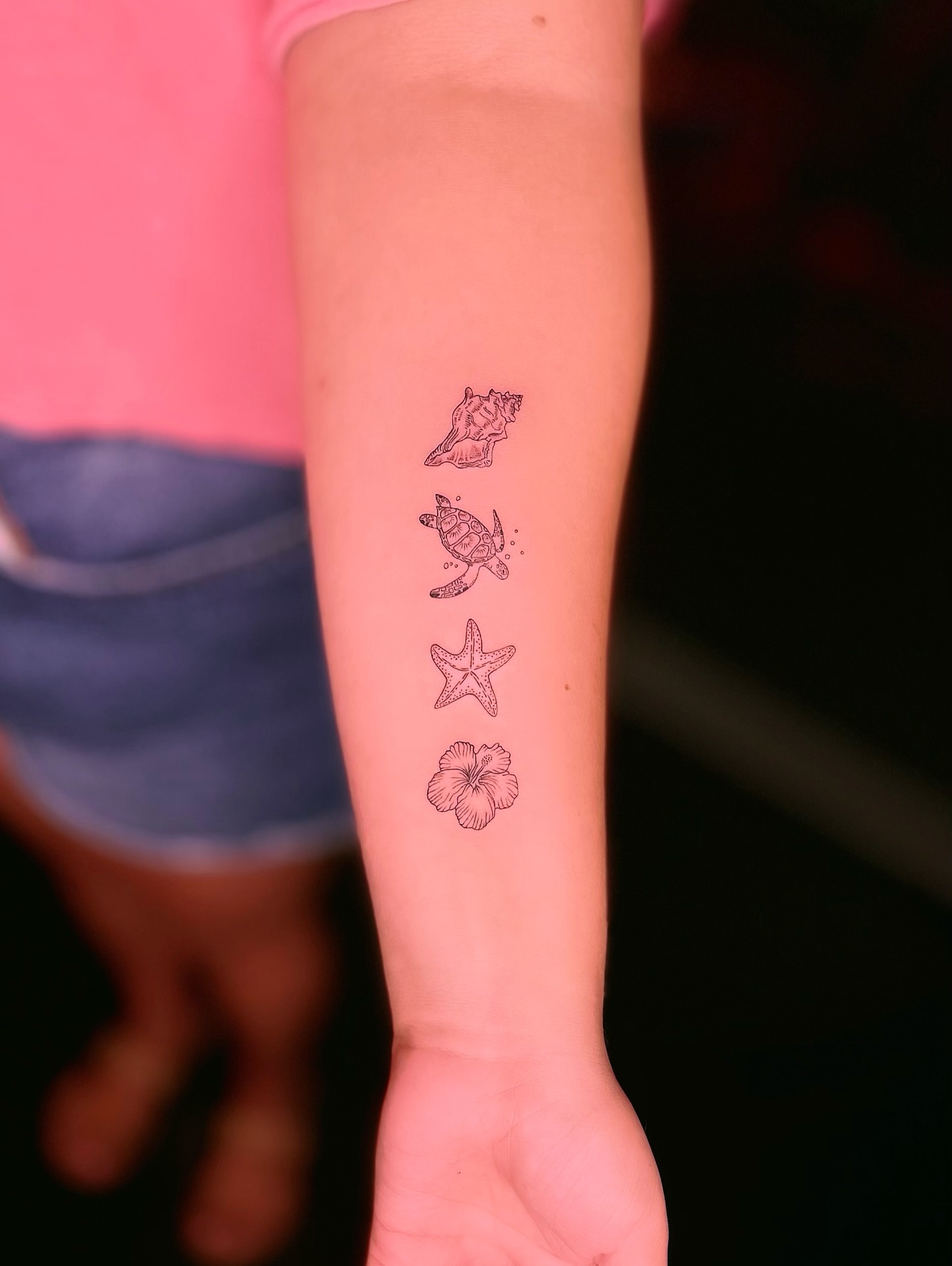 Seashell, turtle, starfish, hibiscus flower dotwork tattoo on the forearm by shawns π fine line & tiny tattoos