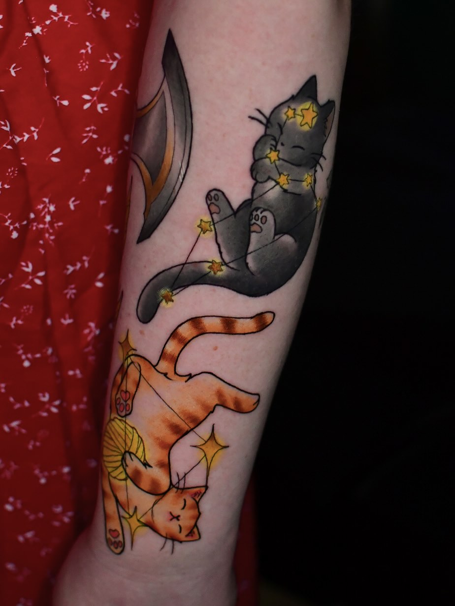 Cats and stars watercolor tattoo on the forearm by Karina πΌ Orange County Tattoo Artist