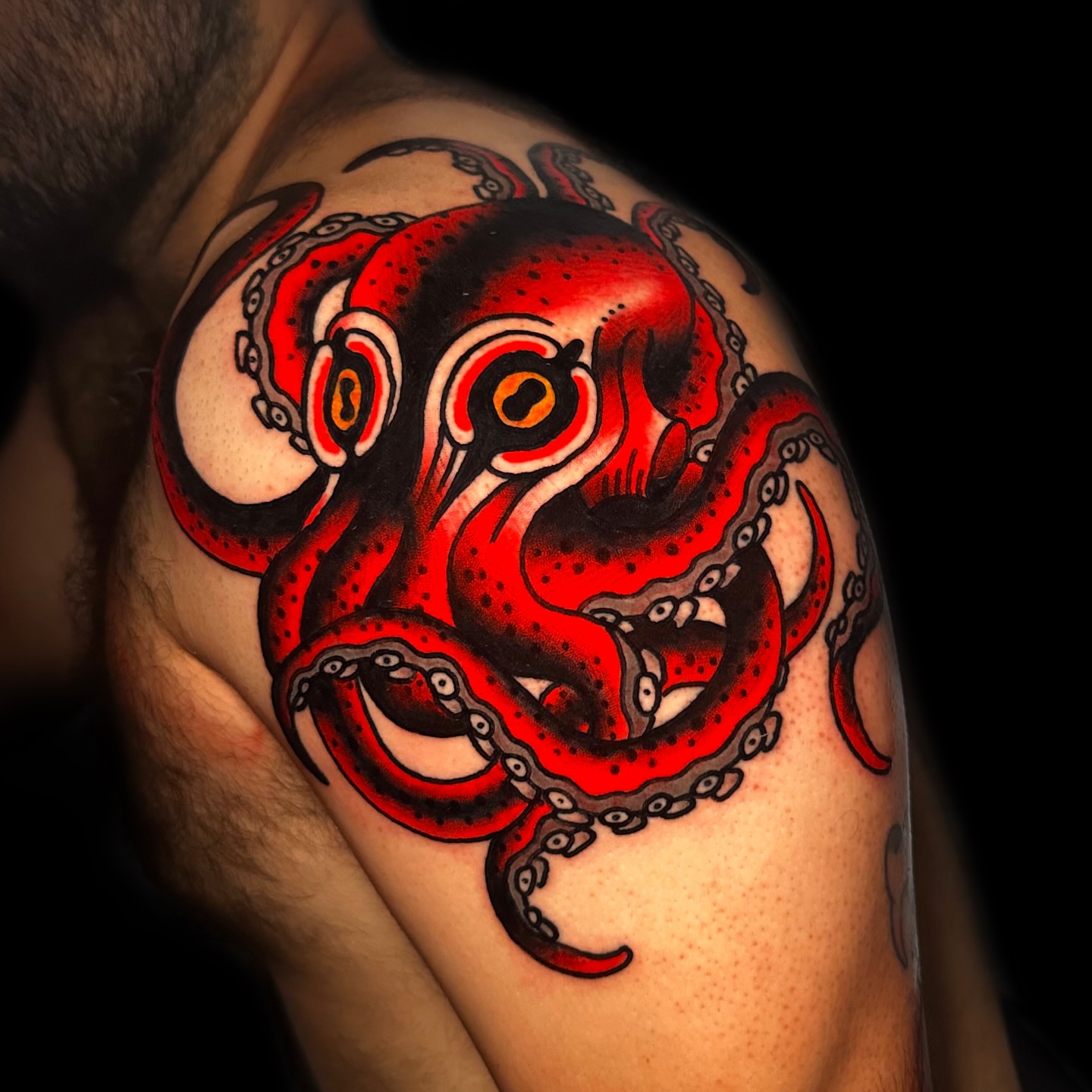 Octopus American traditional tattoo on the shoulder by Danny Reis