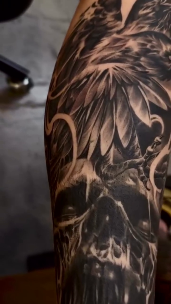 Raven and skull dark realism tattoo by Las Vegas tattoo Artist