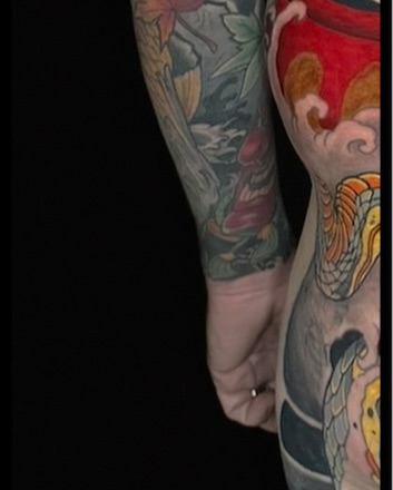Bird and dragon American traditional tattoo on the forearm by Las Vegas Japanese Tattoo Artist, Las Vegas, Nevada