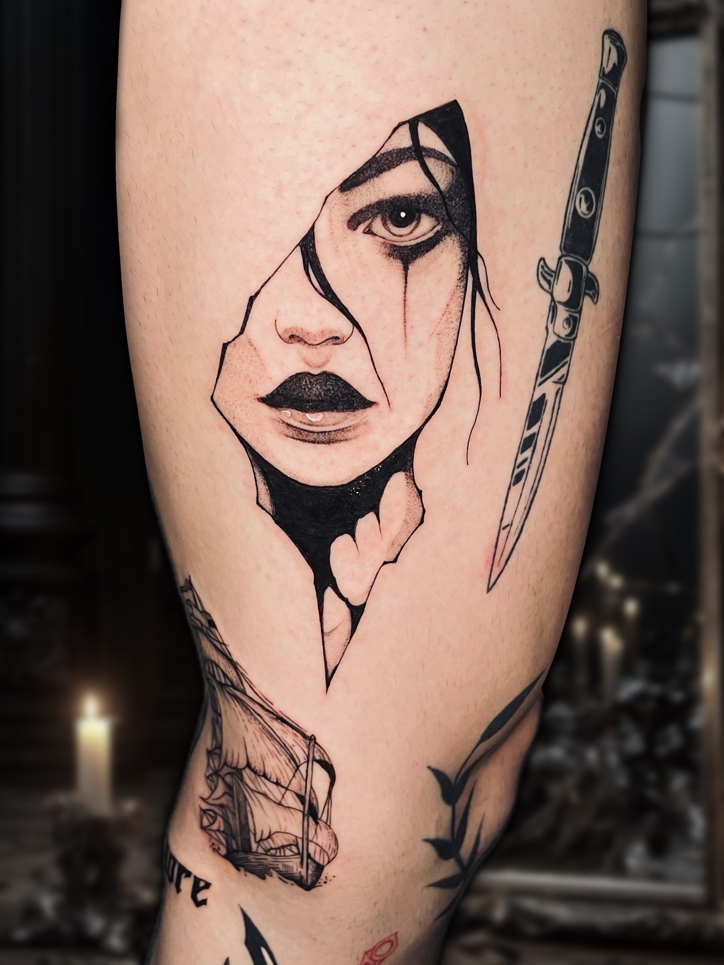 Woman with knife realism tattoo on the thigh by Shontel Fowler