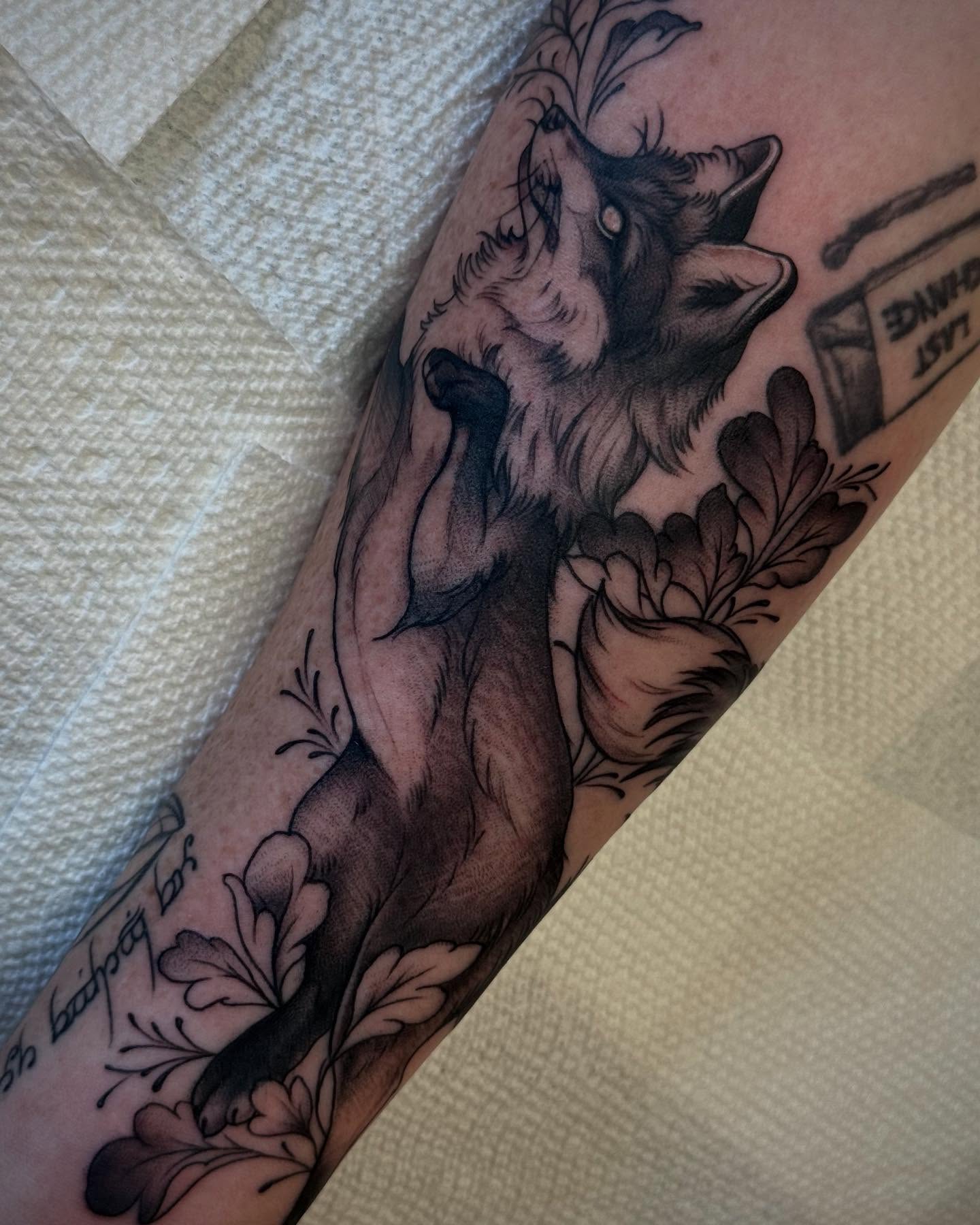 Wolf realism tattoo on the forearm by Espinal