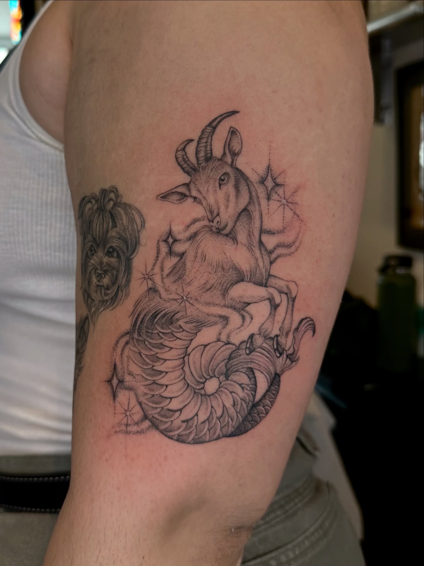 Goat and snake black and grey tattoo on the forearm by Адріянна Стабс 🇺🇦, New York, New York