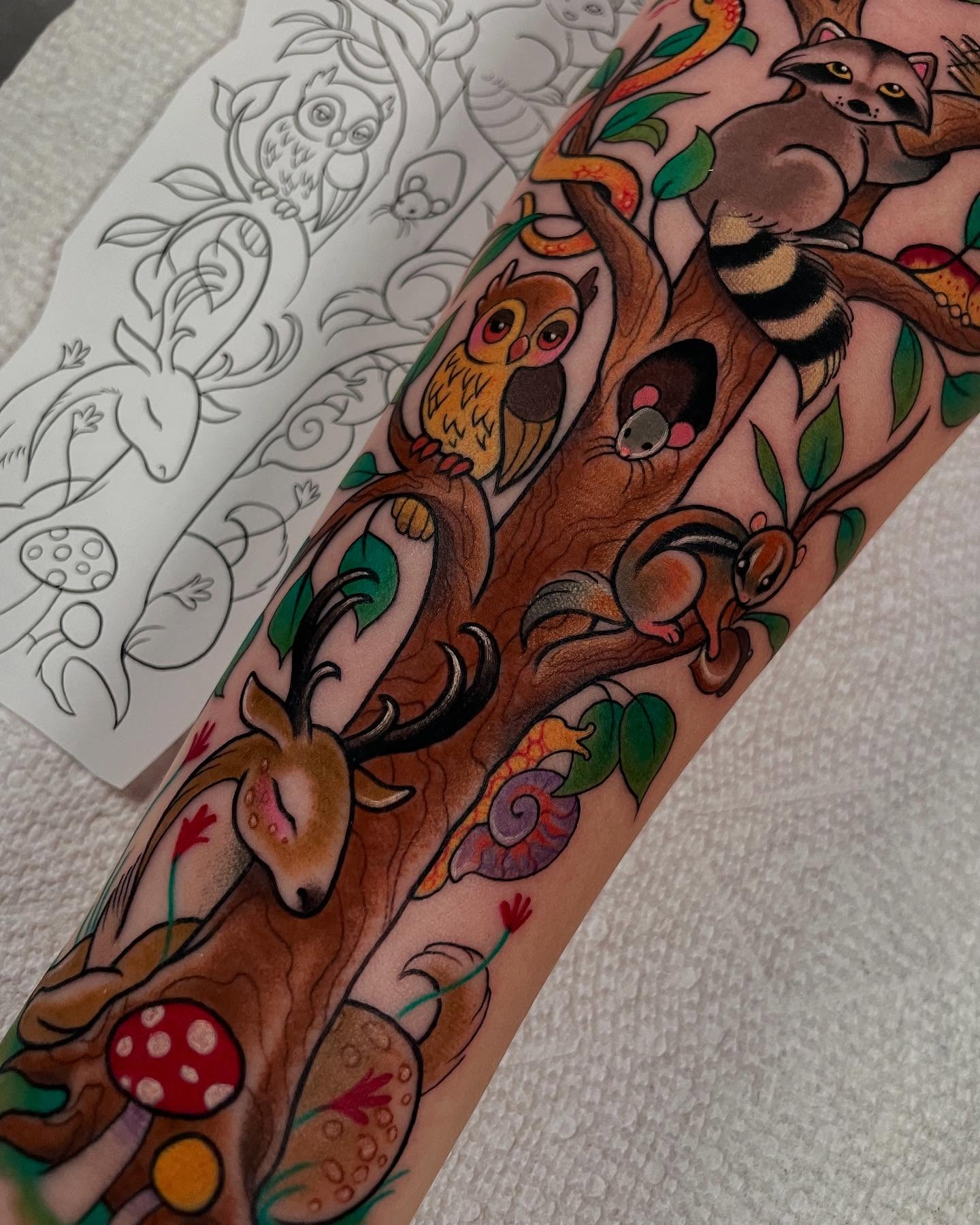 Forest animals new school tattoo on the forearm by Sarah Baldwin