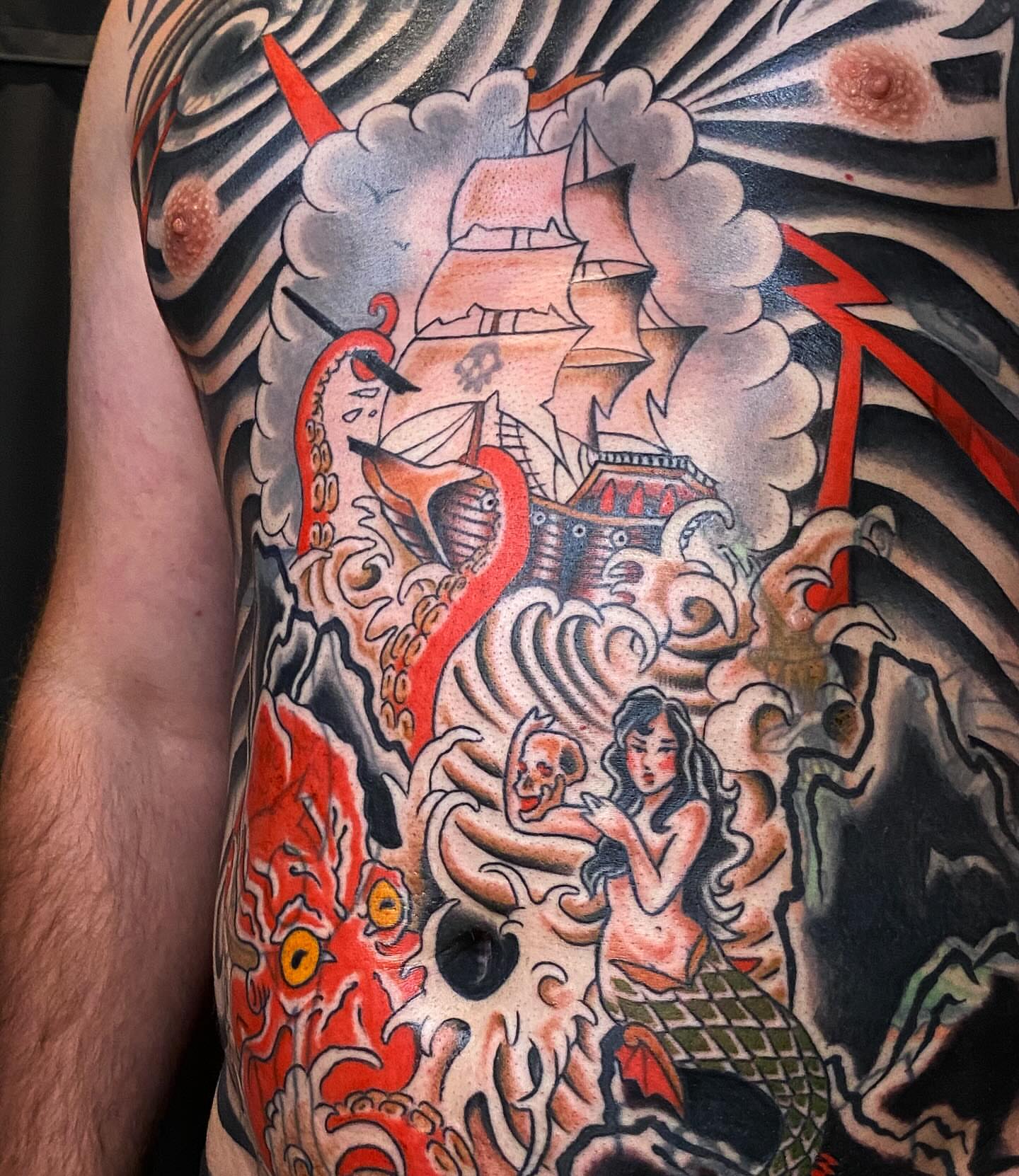 Mermaid and ship American traditional tattoo on the thigh by Morgana Sutherland