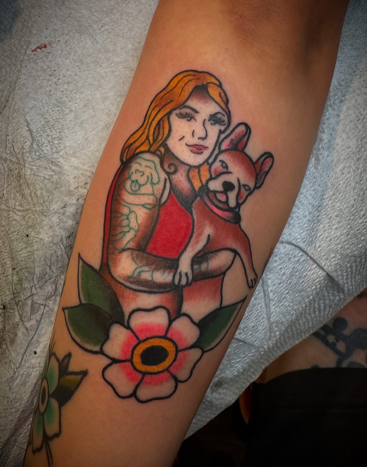 Woman with dog American traditional tattoo on the forearm by Matt Tyefisher