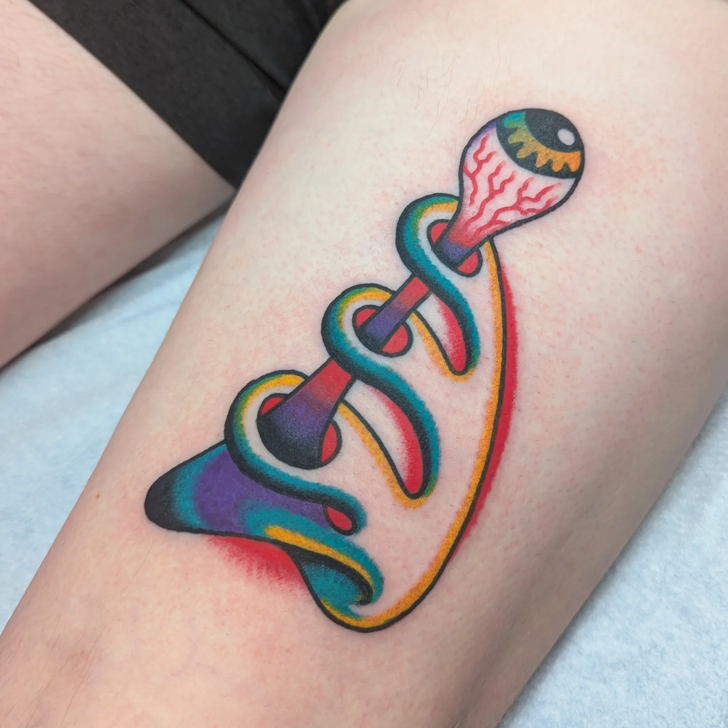 Abstract design new school tattoo on the thigh by Zack Mueller