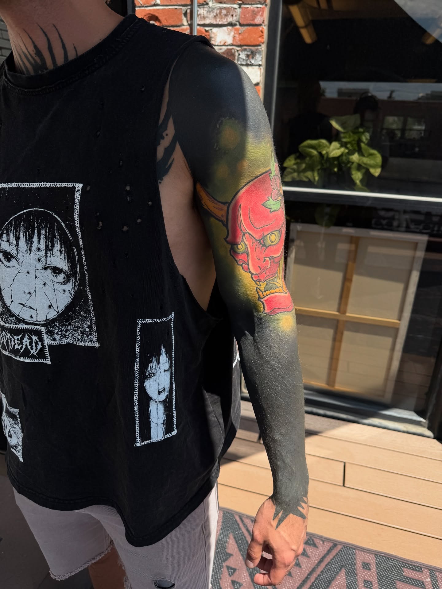 Demon japanese irezumi tattoo on the upper arm by Denver Blackout Tattoo Specialist - Anthony