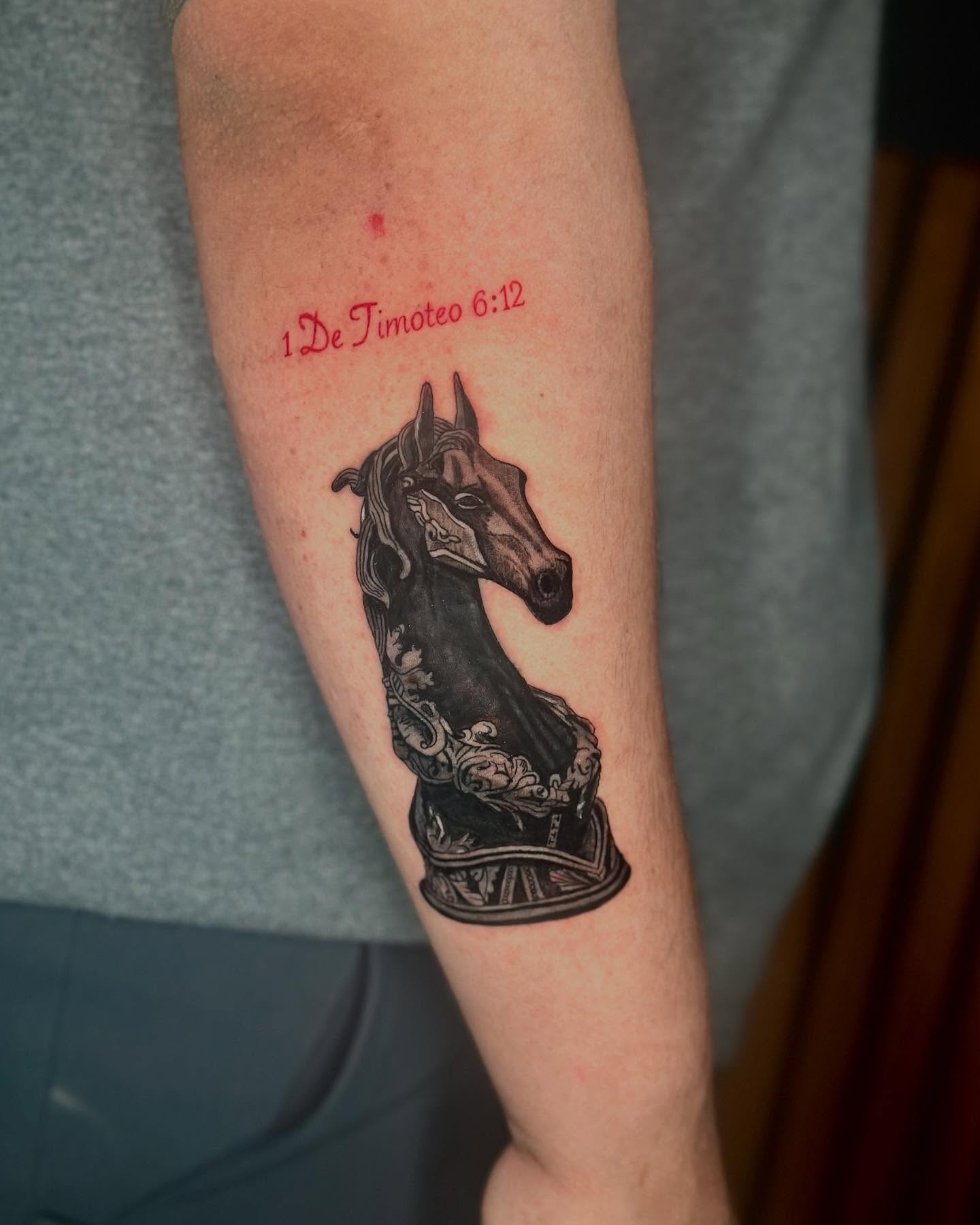 Horse head black and grey tattoo on the forearm by Felipe Pacifico
