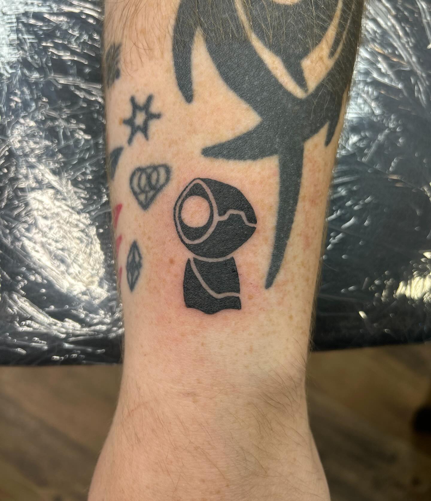 Robot black and grey tattoo on the forearm by Abby Camacho - Tattoo Artist and Piercer โจ๐
