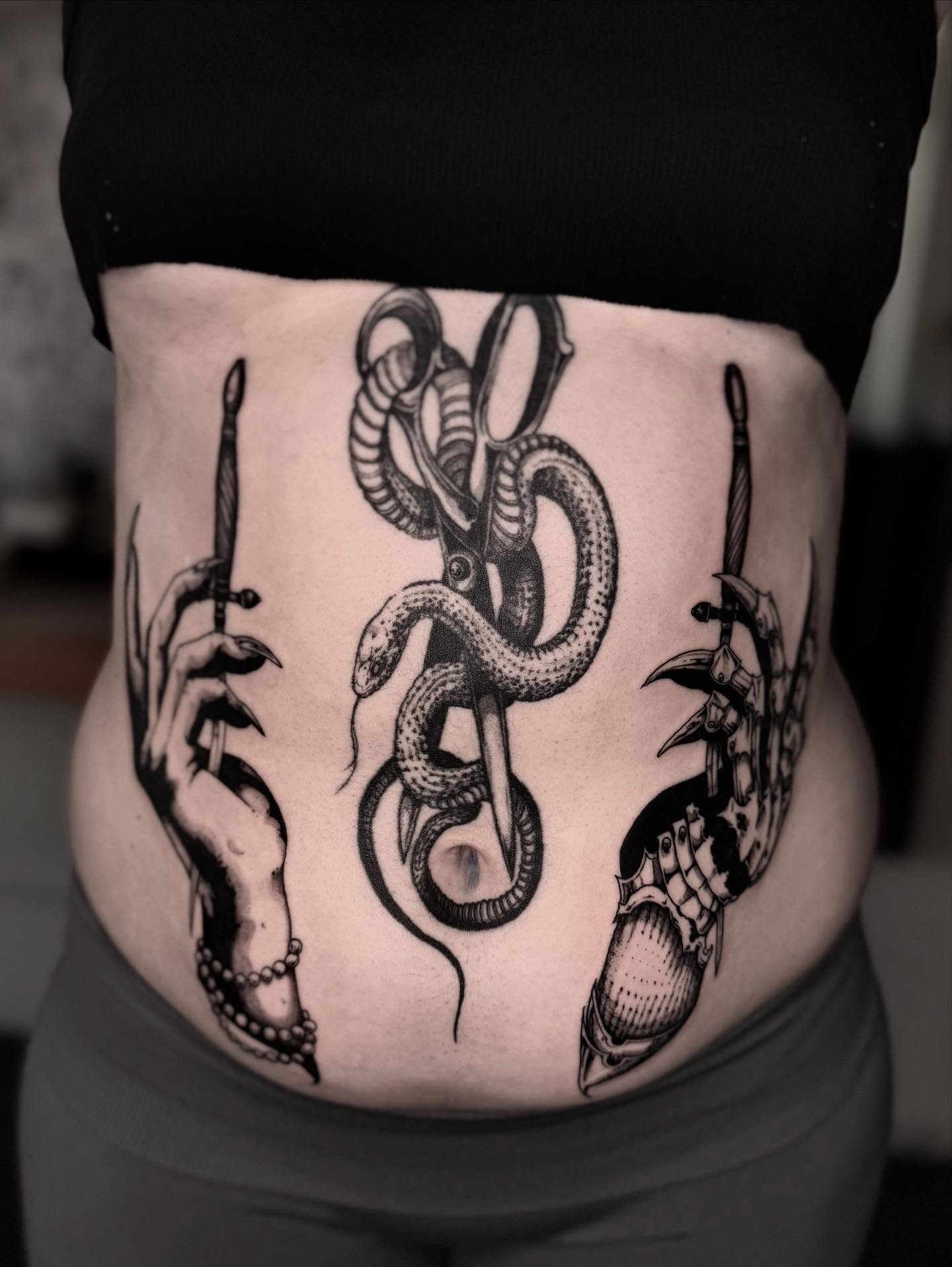 Snake and scissors realism tattoo on the torso by 𝐋𝐢𝐬𝐚 𝐊𝐨𝐫𝐳𝐞𝐧𝐨𝐰𝐬𝐤𝐢