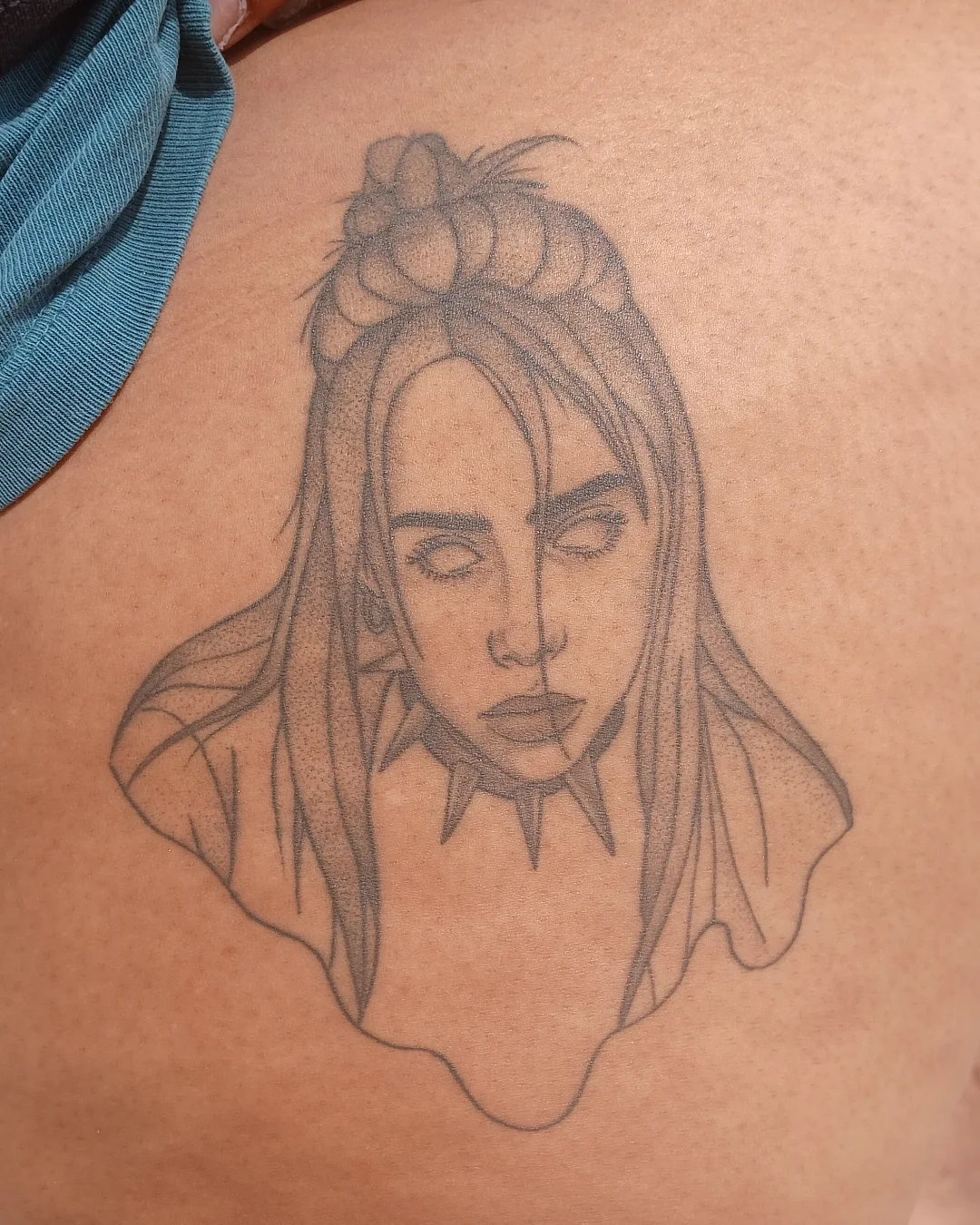 Woman with braided hair dotwork tattoo on the shoulder by Cassieal Welch