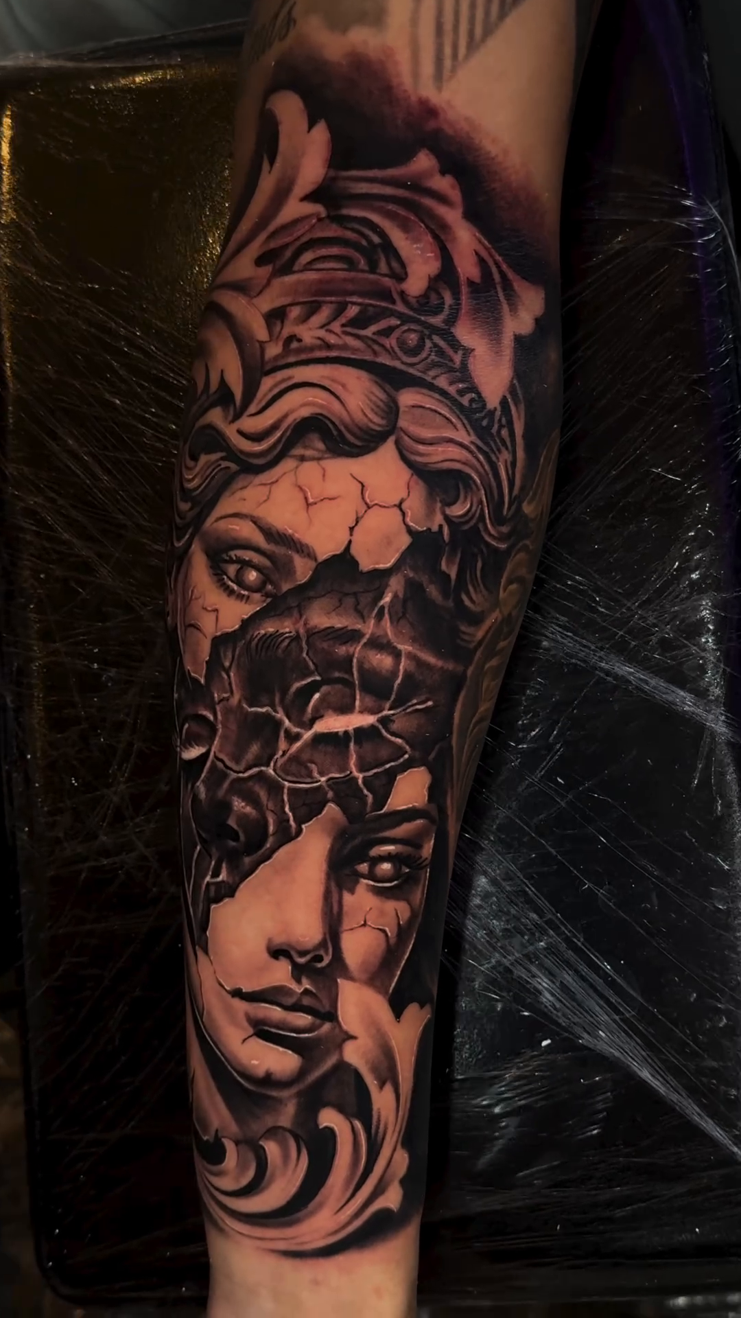 Tattoo by @obsidianinkstudio — realism, black_and_grey