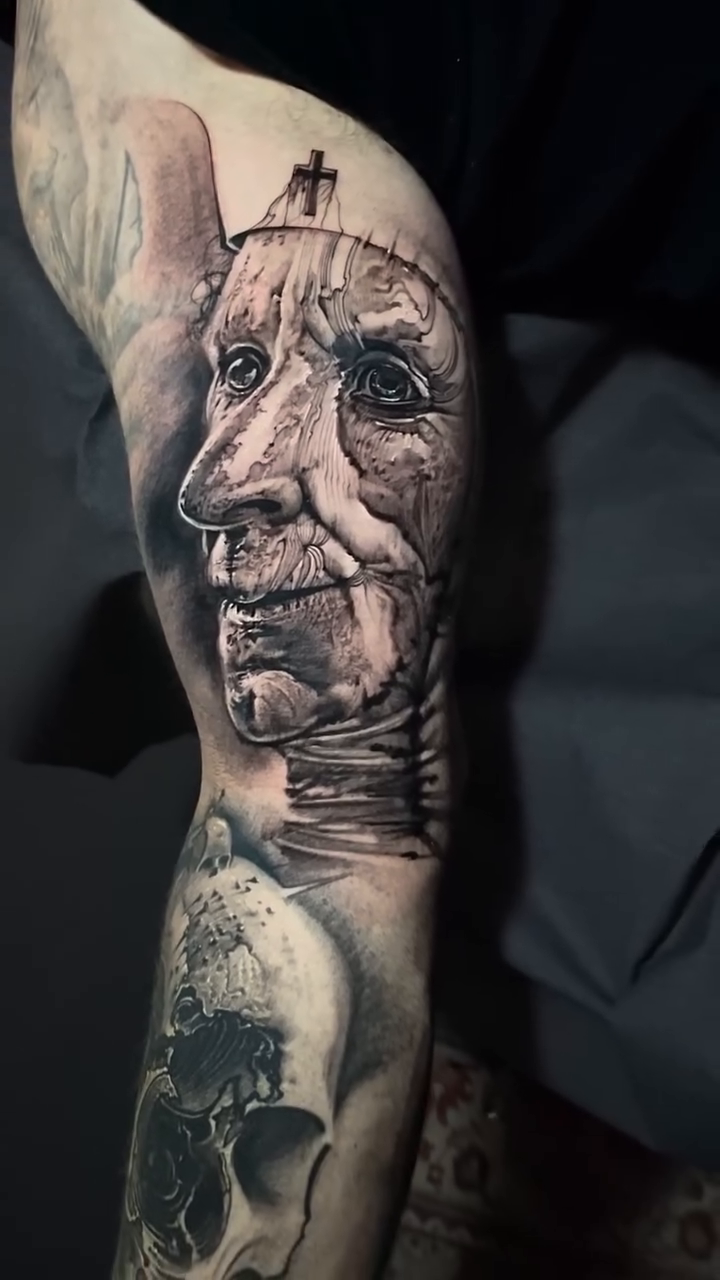 Old man's face realism tattoo by Robert Hernandez