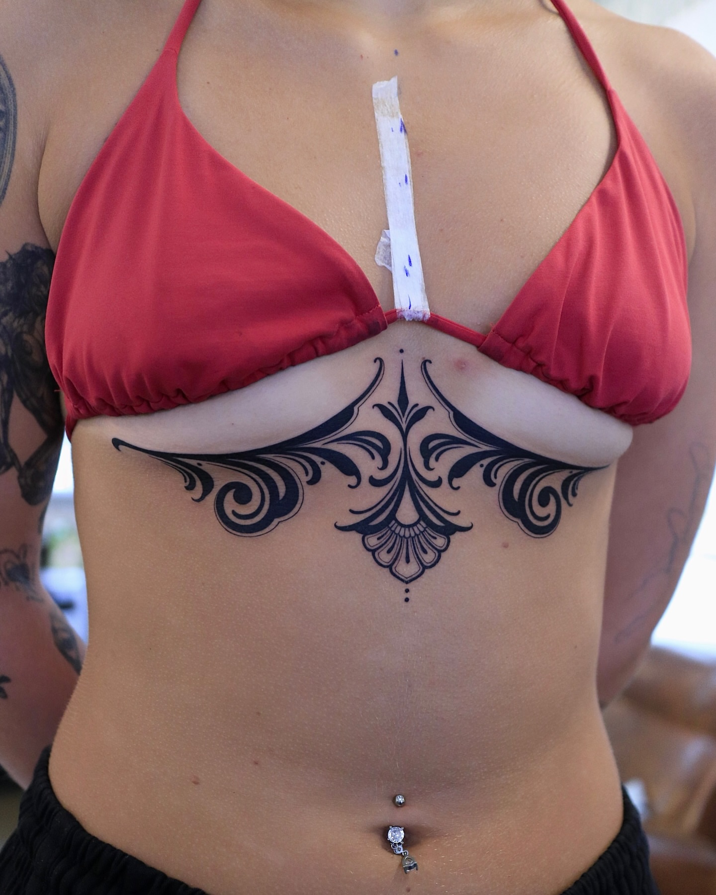 Floral ornament ornamental tattoo on the torso by Seoul tattoo