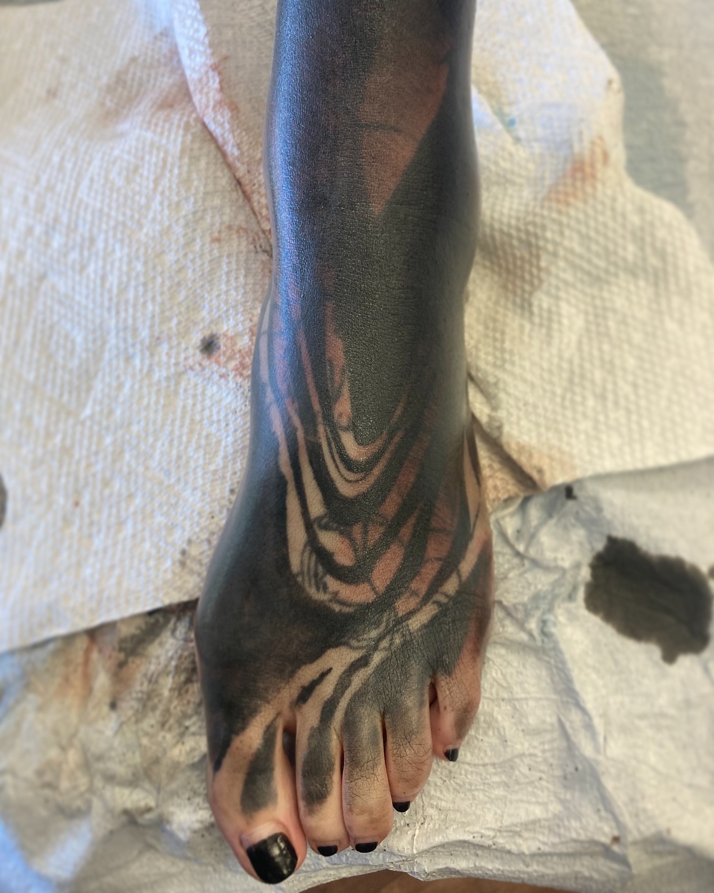 Abstract pattern black and grey tattoo on the foot by Rizzie D'Alterio